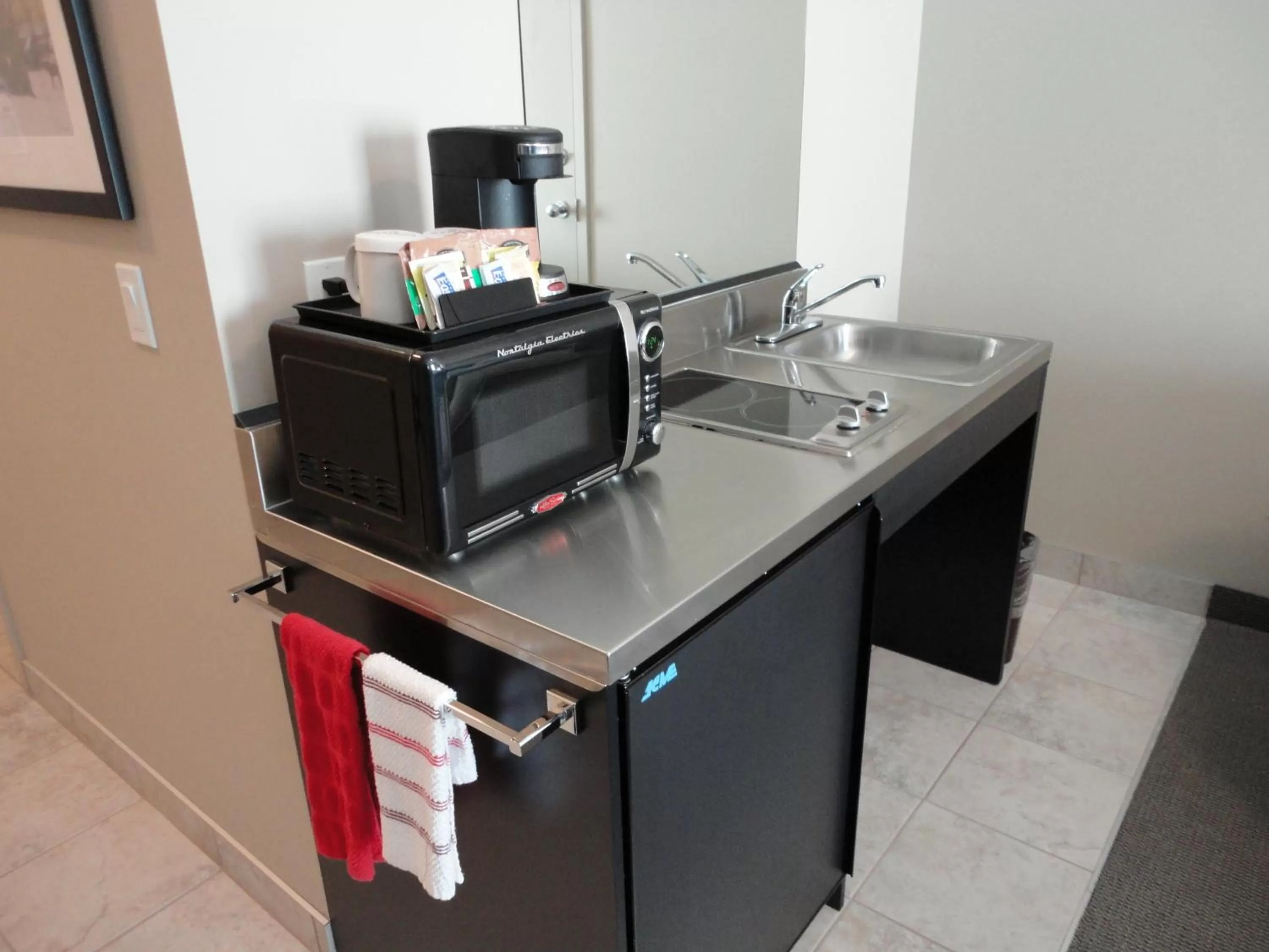 Kitchen or kitchenette in Ramada by Wyndham Emerald Park/Regina East
