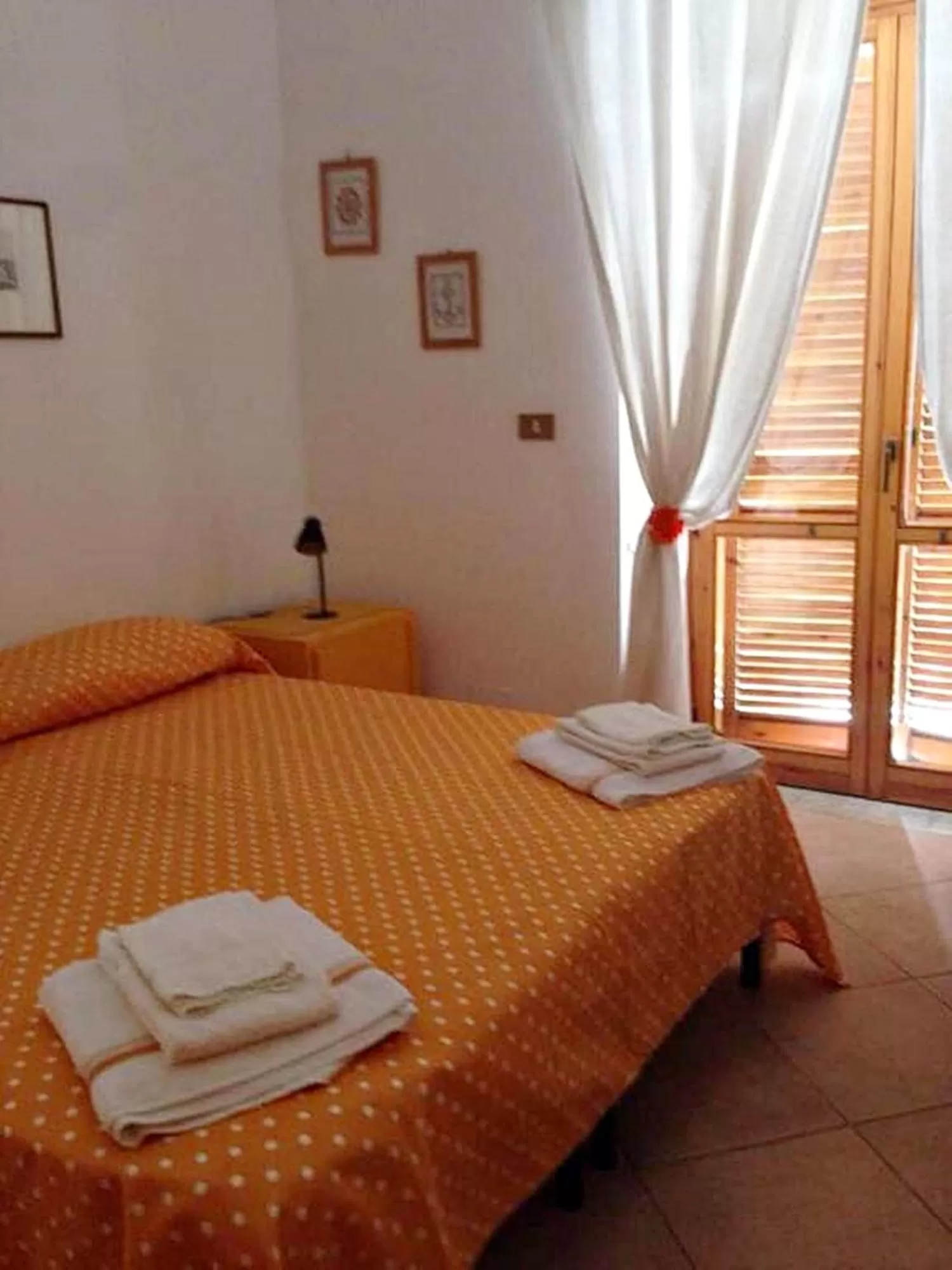 Photo of the whole room, Bed in La Terrazza sul porto