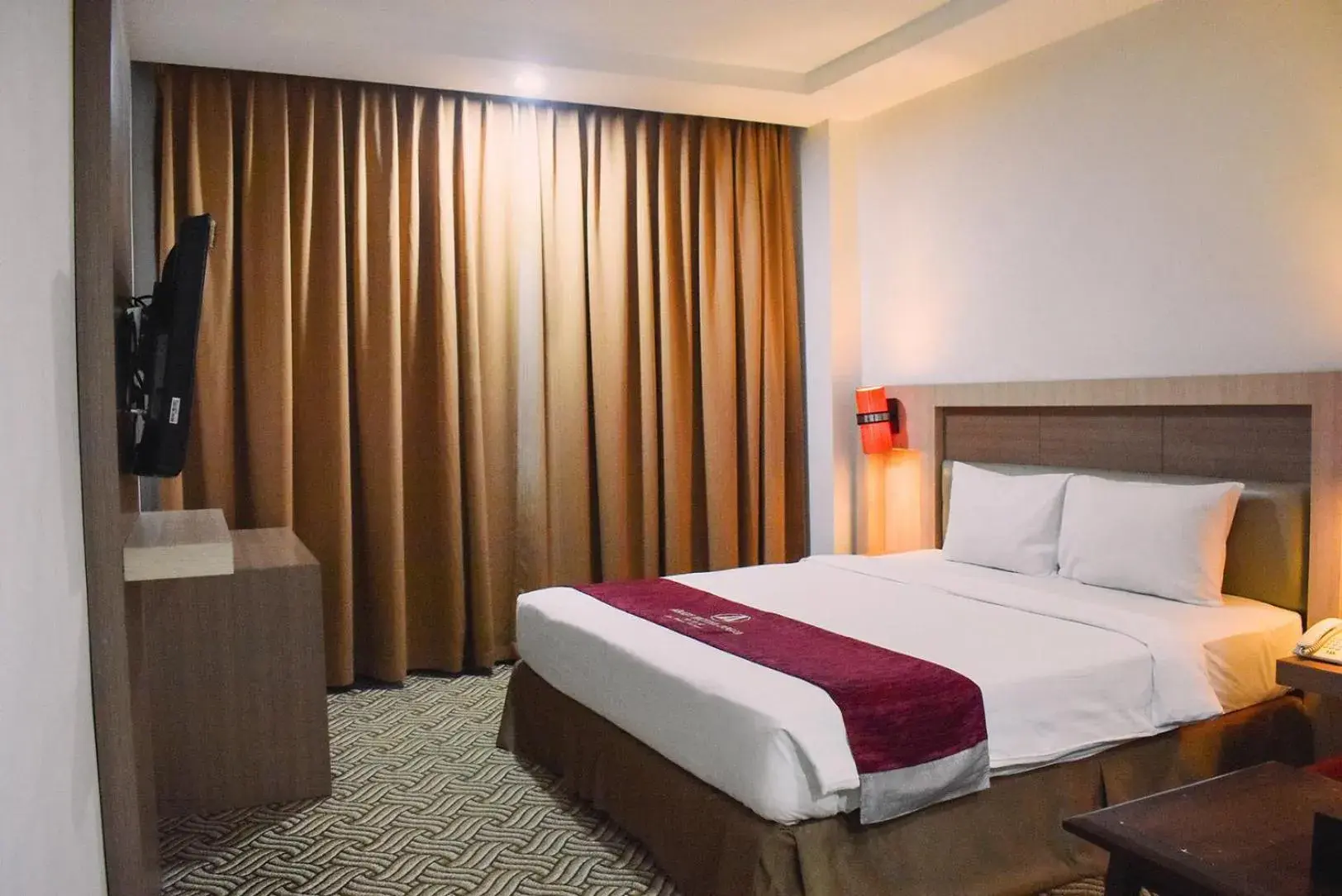 Bedroom, Bed in Abadi Hotel Malioboro Yogyakarta by Tritama Hospitality