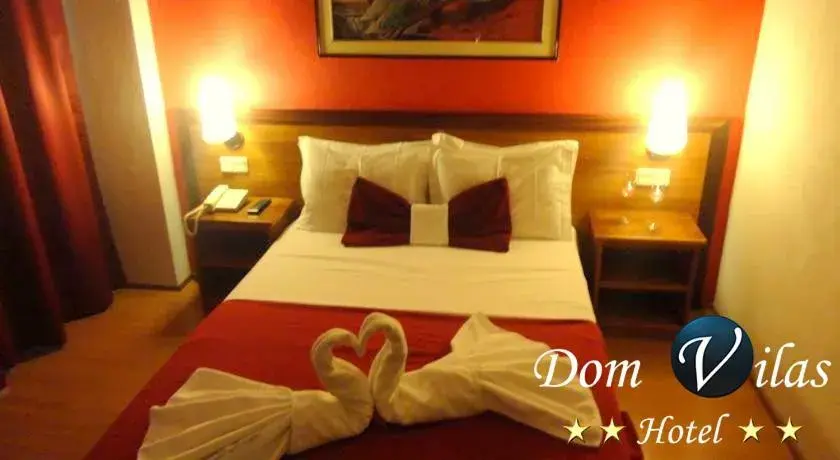 Bed in Hotel Dom Vilas