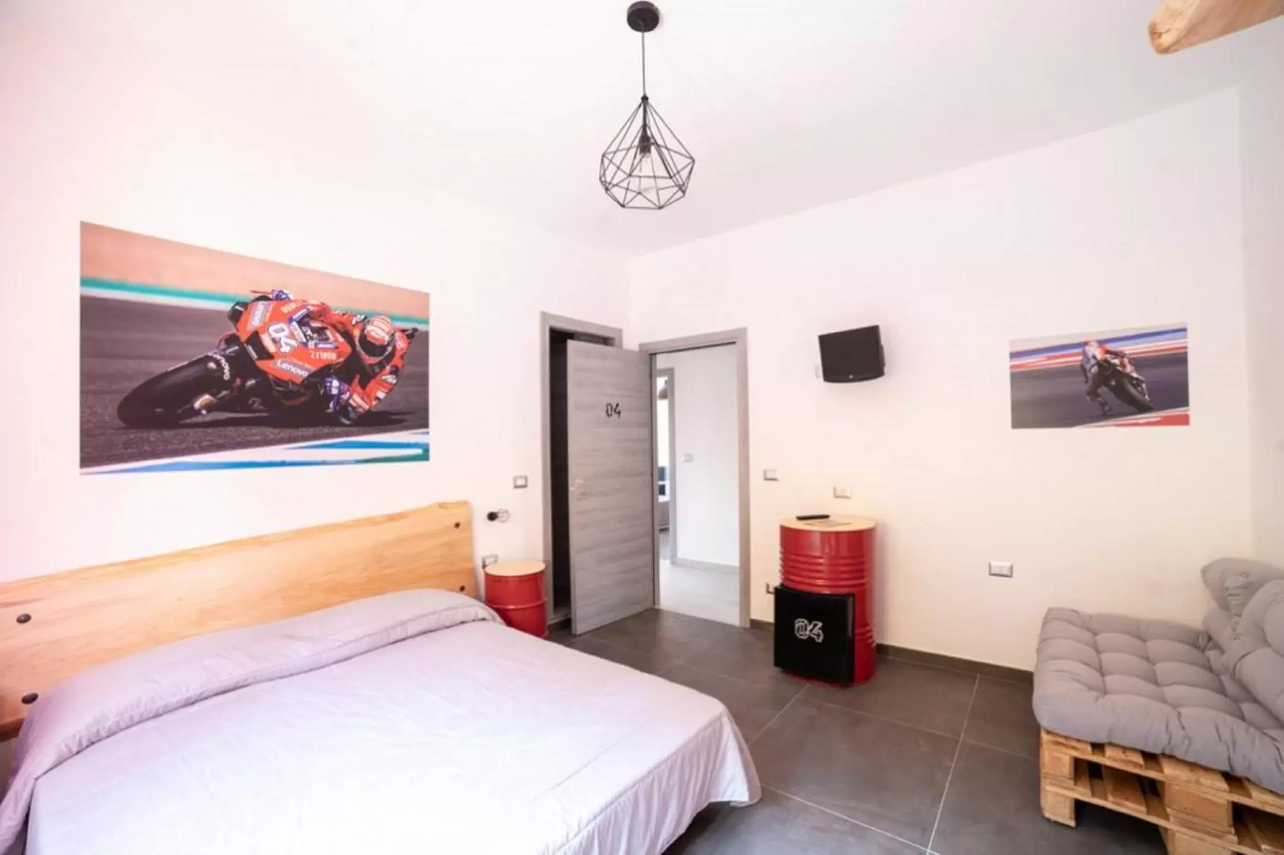 Bedroom, TV/Entertainment Center in Italian Piston House Sport Moto Rent