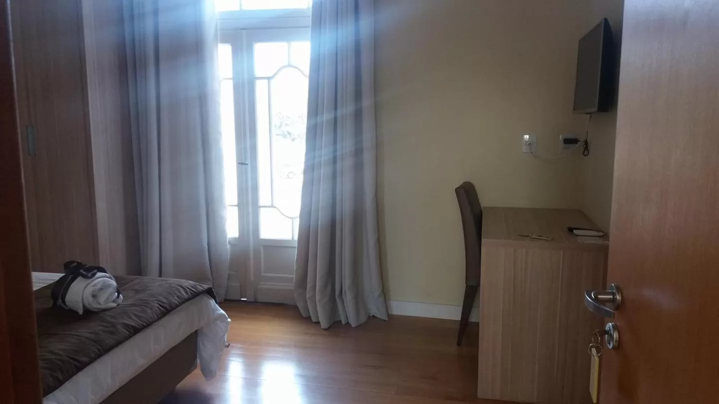 Photo of the whole room, Bed in Hotel Praça da Matriz