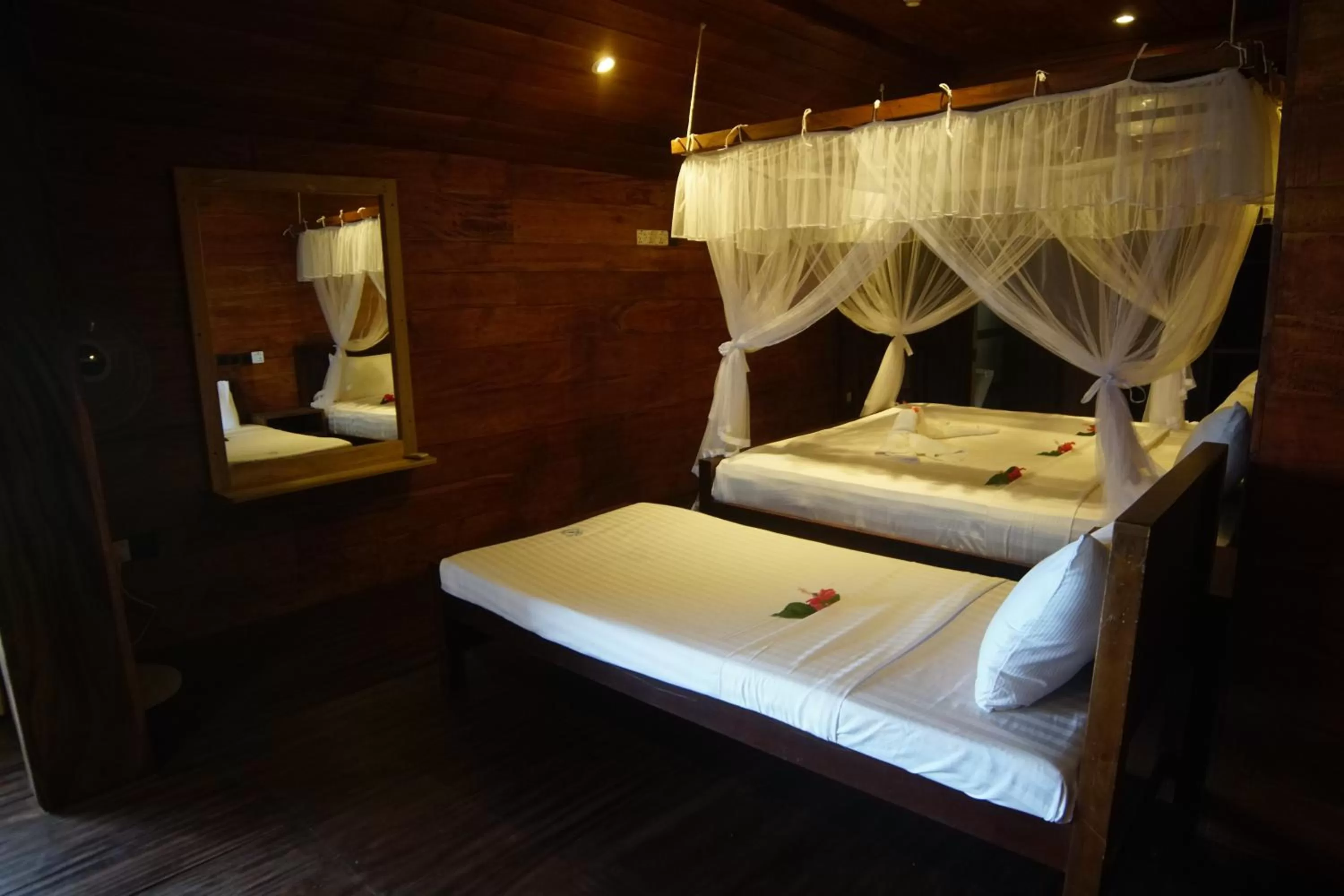 Bed in Turtle Bay Beach Resort