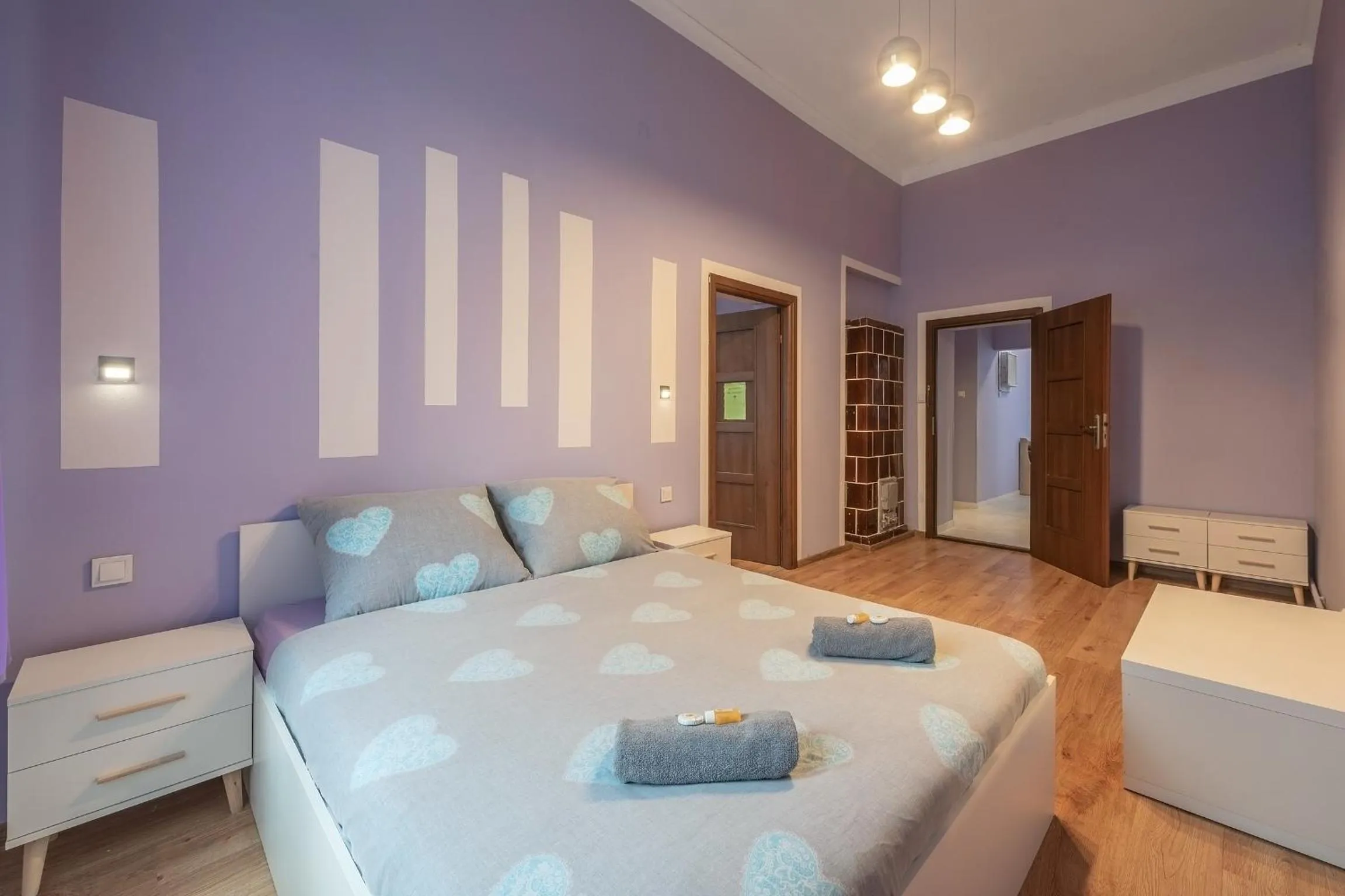 Bed in Queen Apartments