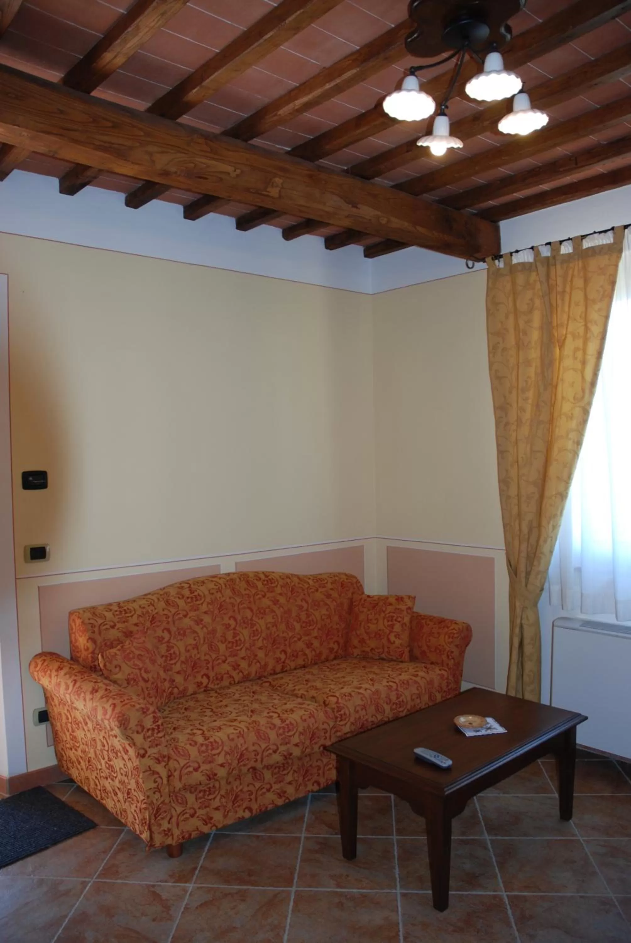 Living room in Albergo La Foresteria