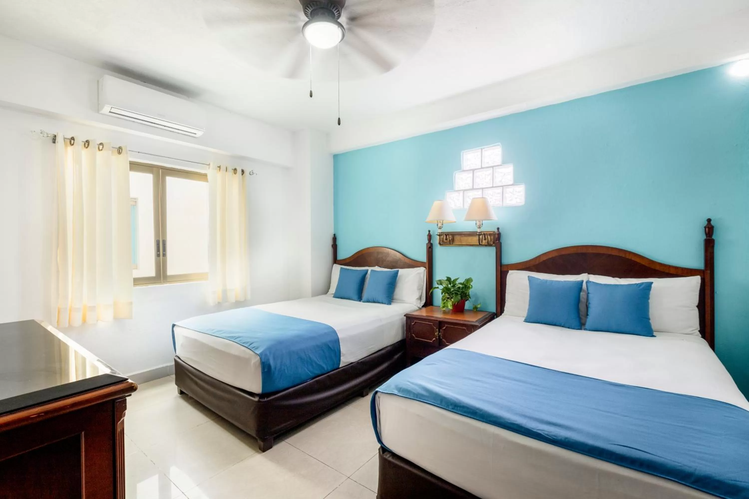 Bed in Hotel Pueblito Vallarta