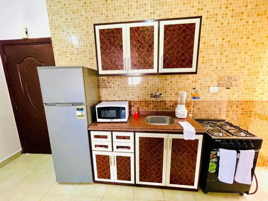 Kitchen/Kitchenette in Charbel apartments