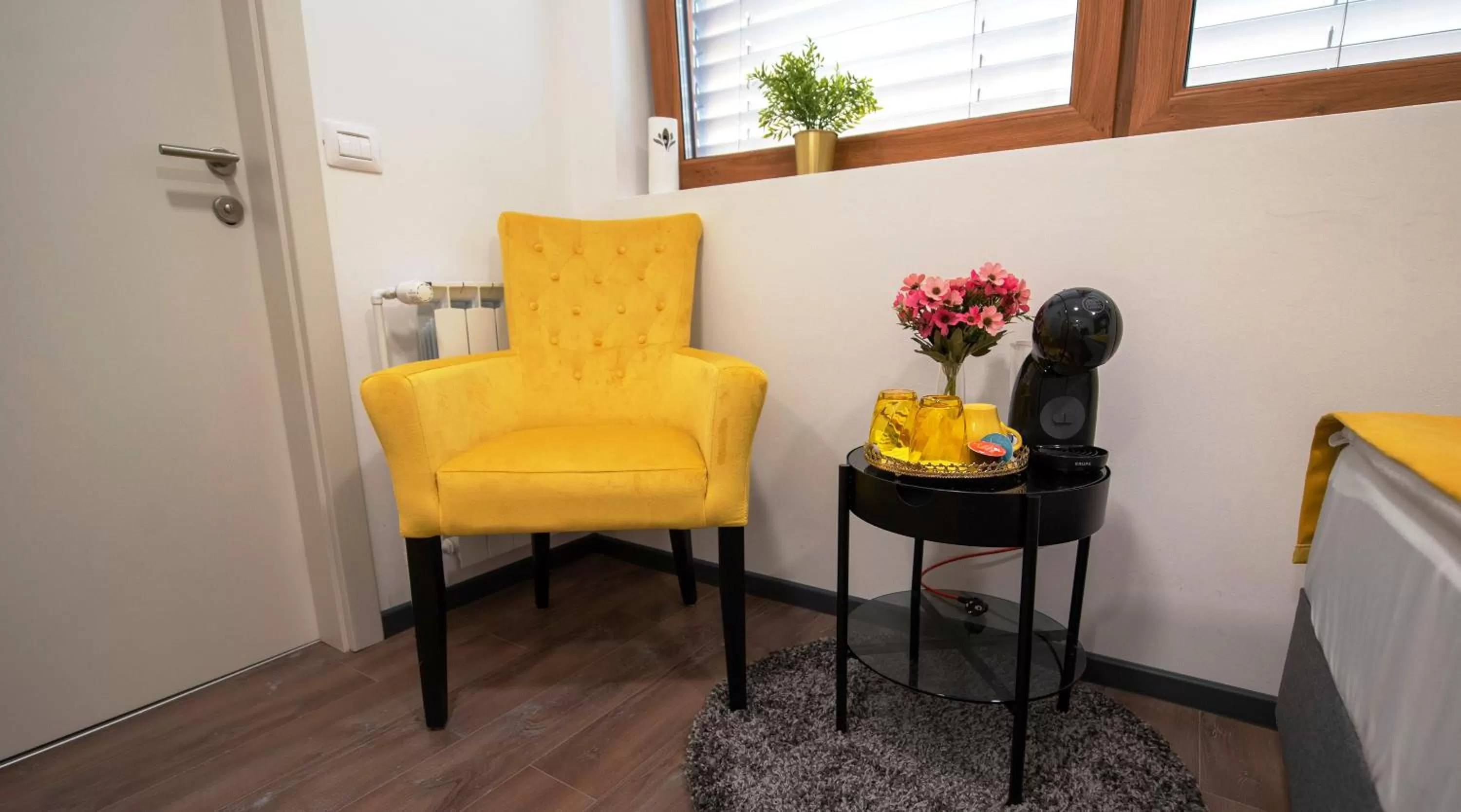 Seating area in Arcobaleno Apartments & Rooms
