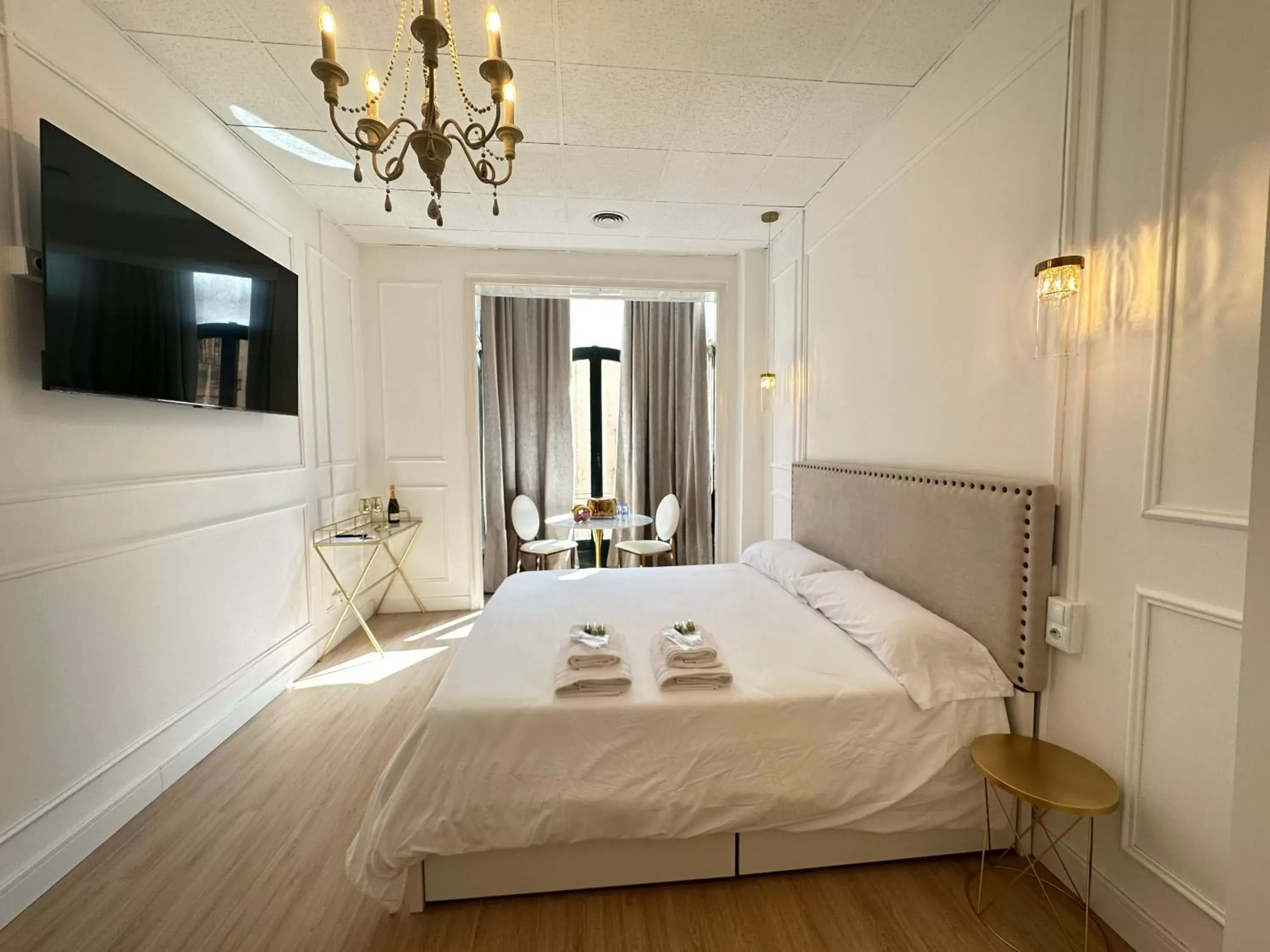 Bed in Siboni Luxury Rooms - Adults Only