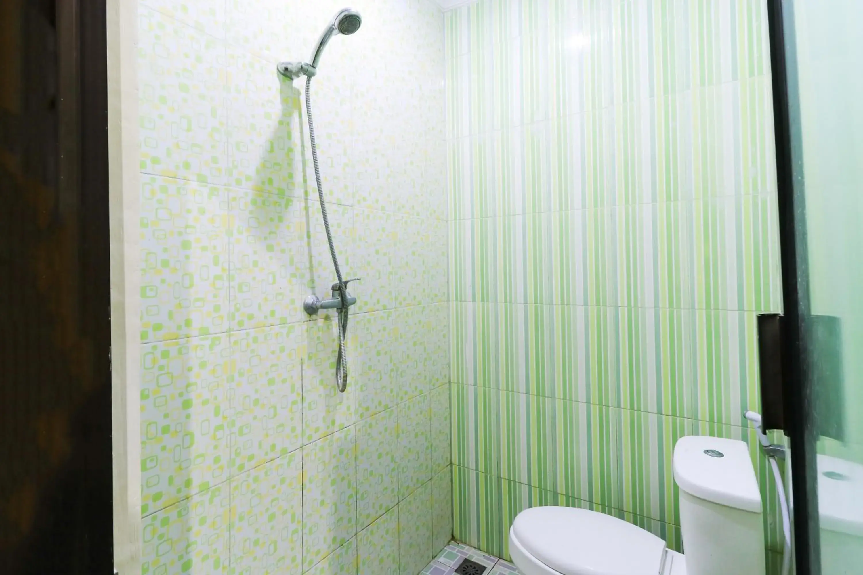 Shower, Bathroom in Labuana Homestay & Cafe Garden by ZUZU