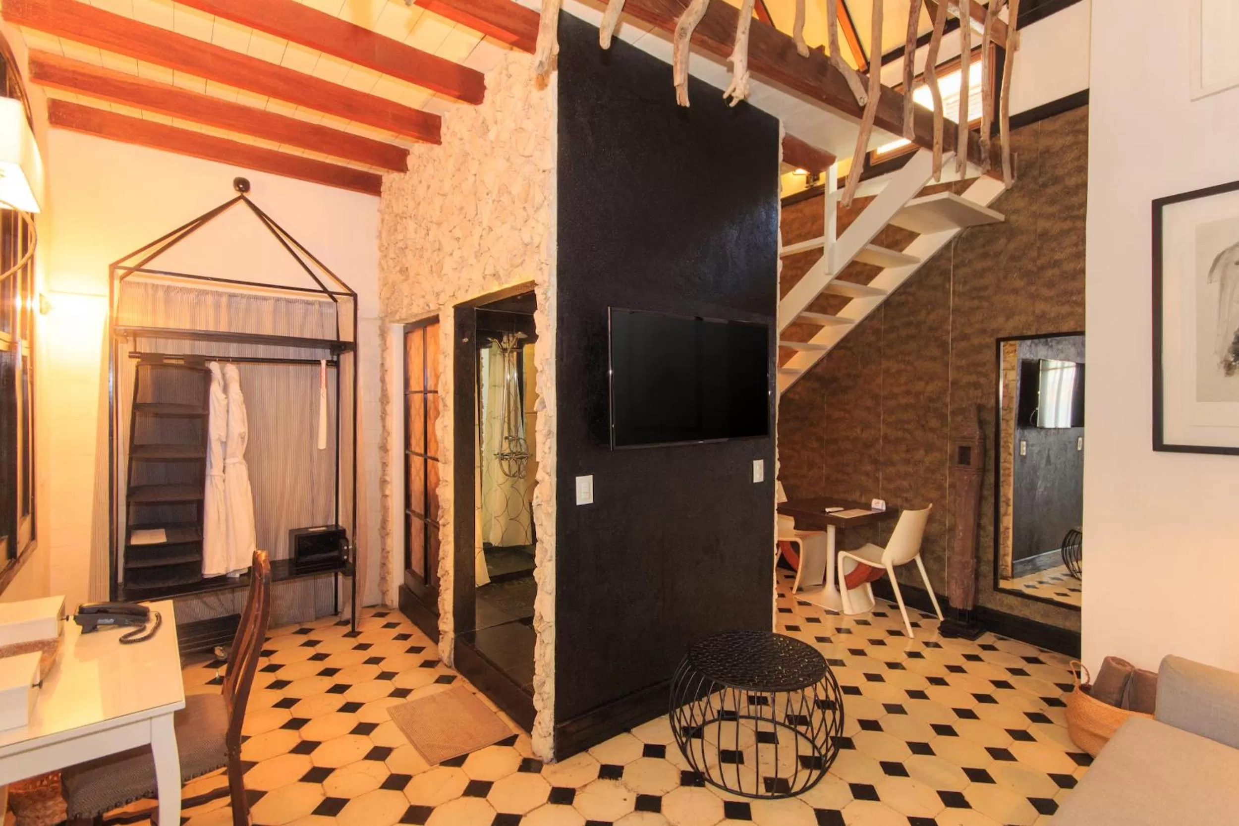 Communal lounge/ TV room in Hotel Casa Lola Deluxe Gallery