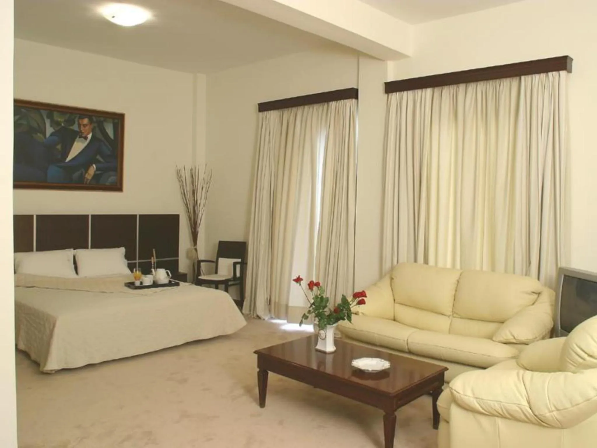 Bed in Blue Sea Hotel Alimos