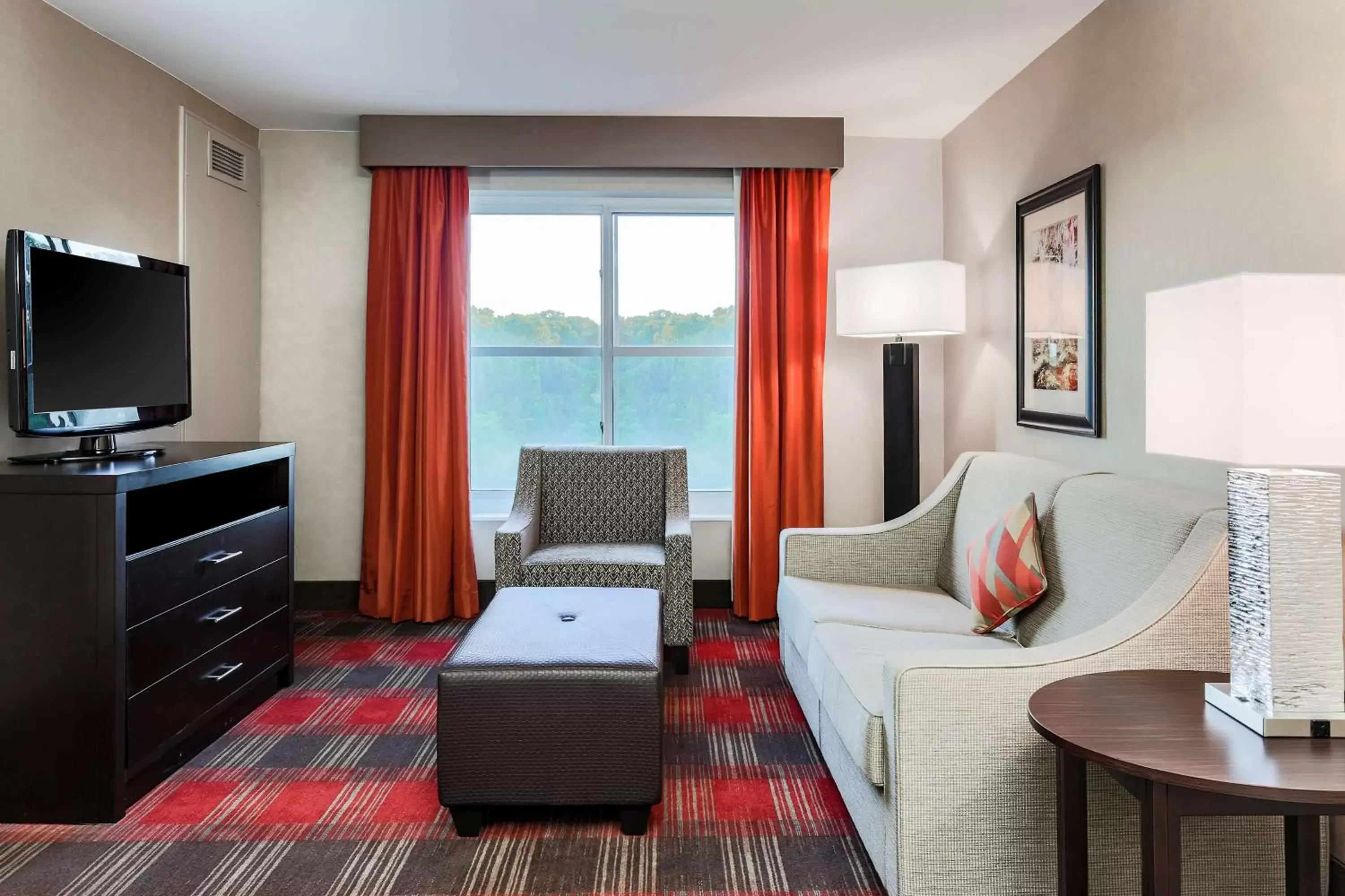Living room, Seating Area in Homewood Suites by Hilton Long Island-Melville