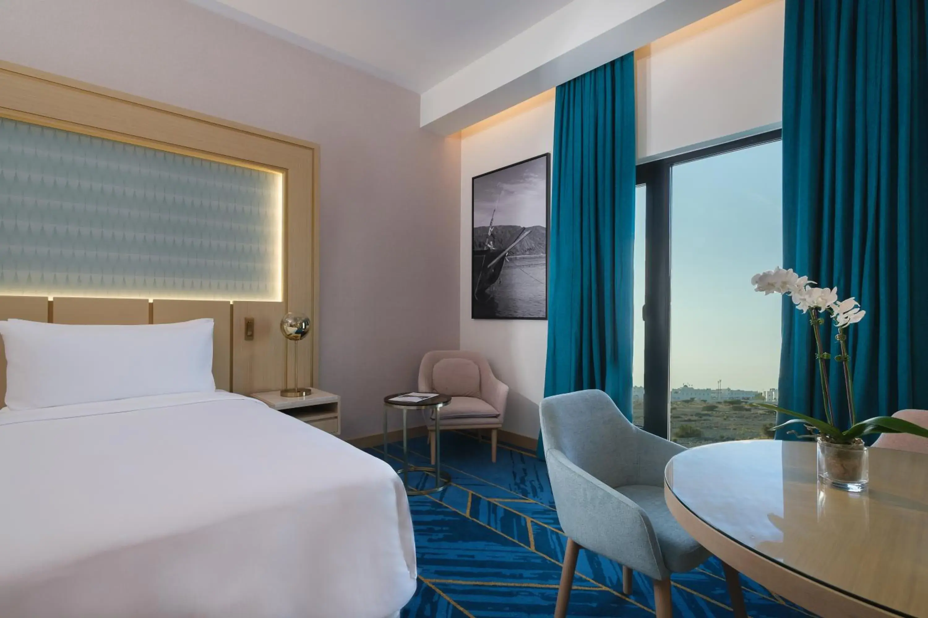 Bedroom in Avani Muscat Hotel & Suites