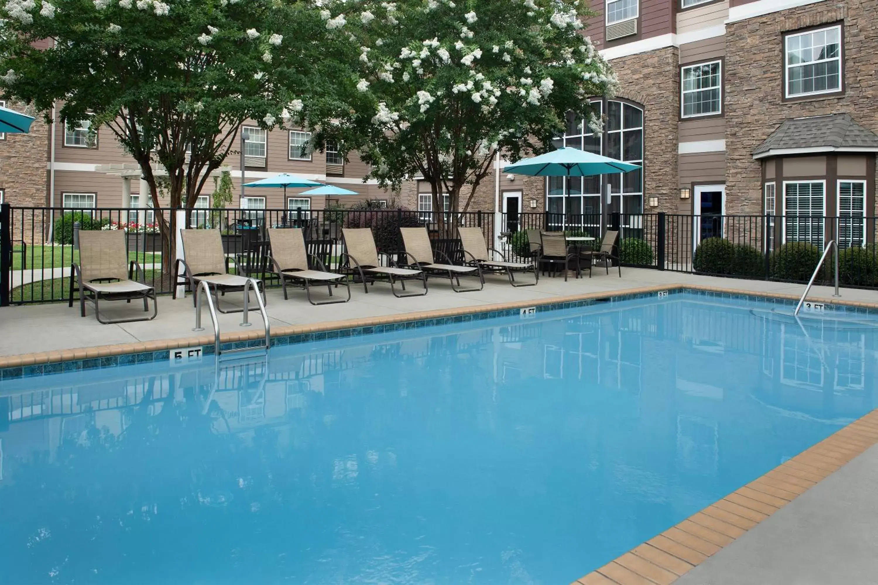 Pool view, Swimming Pool in Staybridge Suites Greenville I-85 Woodruff Road, an IHG Hotel