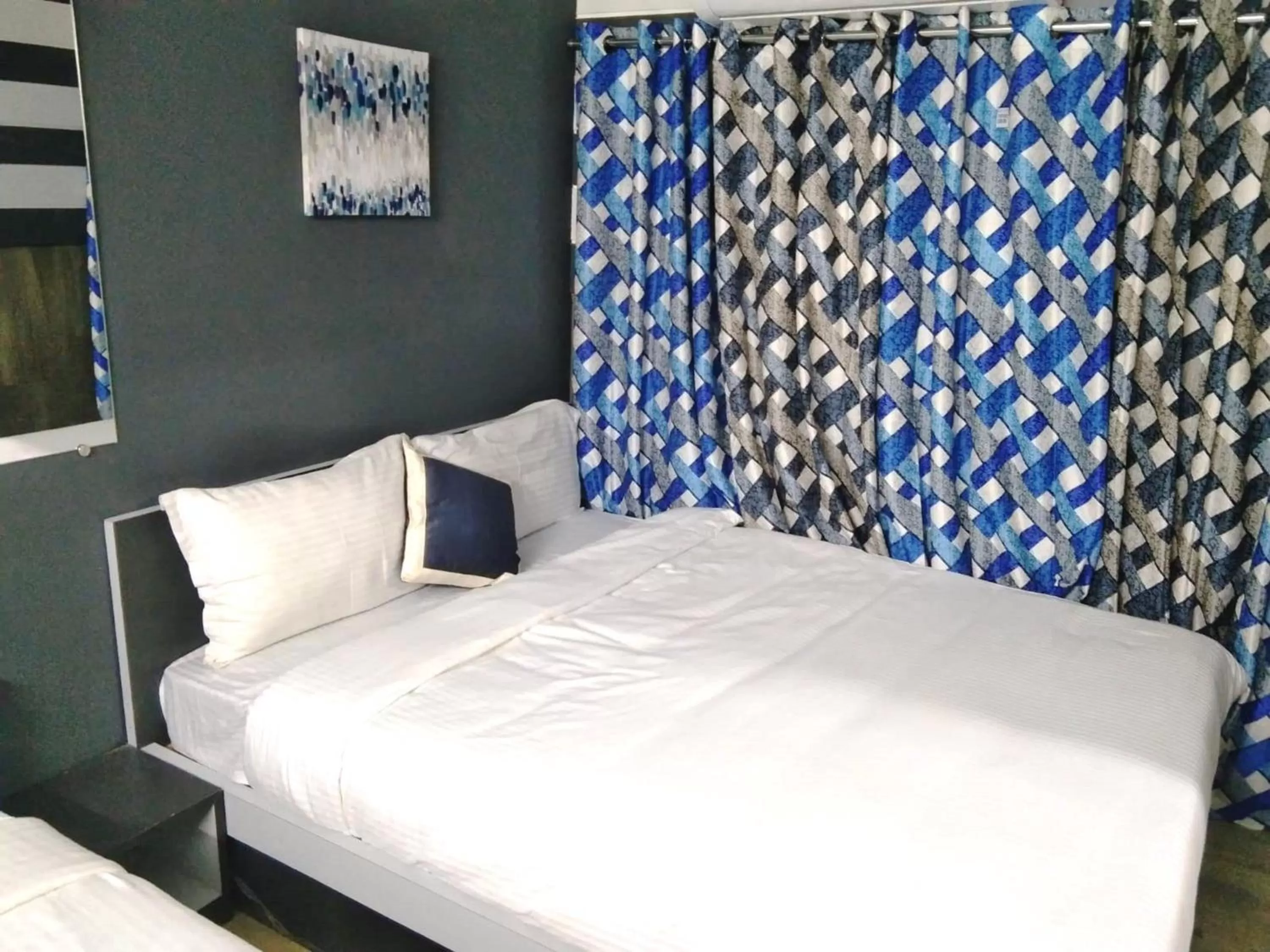 Bed in Silver Cloud Hotel Sholinganallur