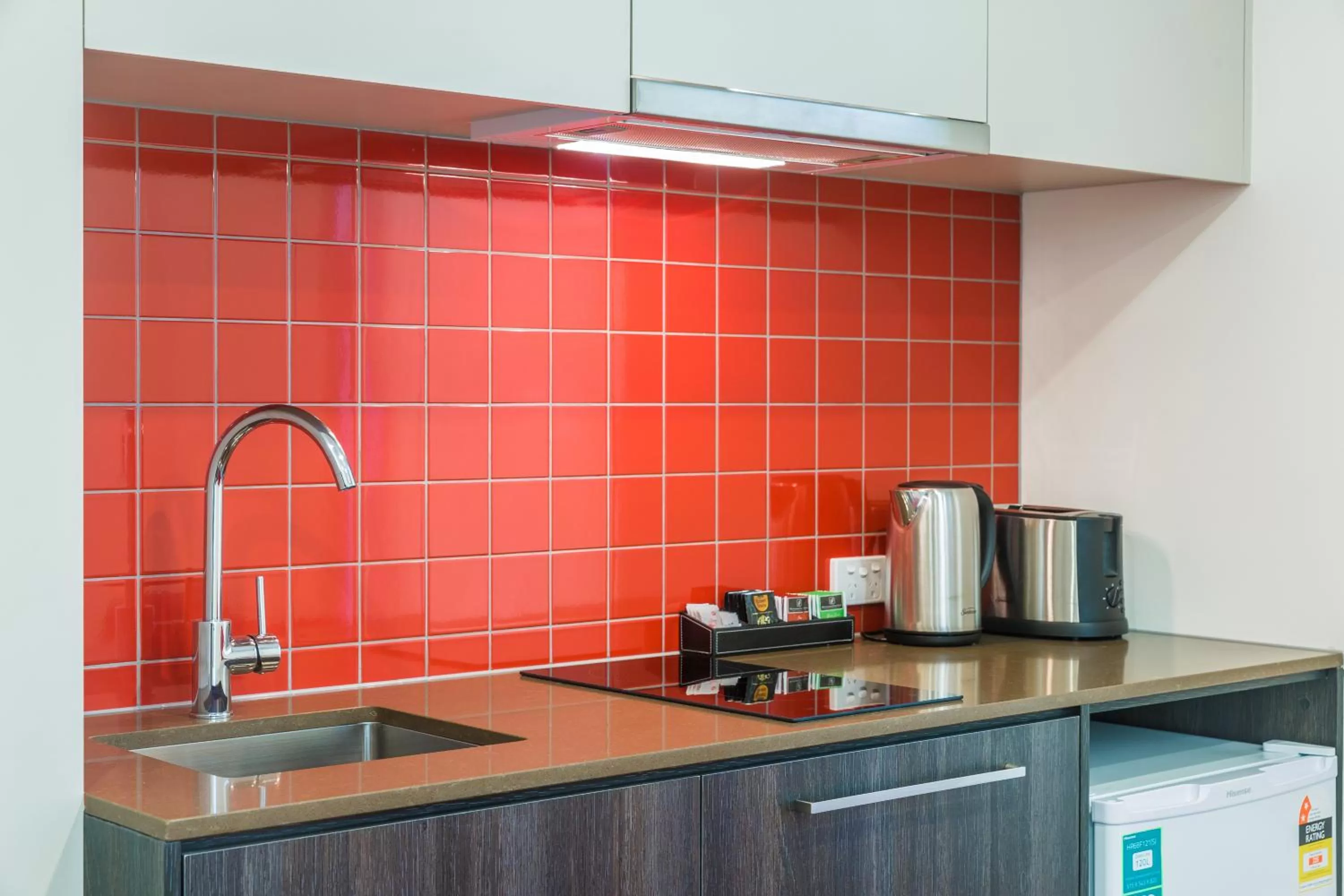 Kitchen or kitchenette in Comfort Apartments Box Hill