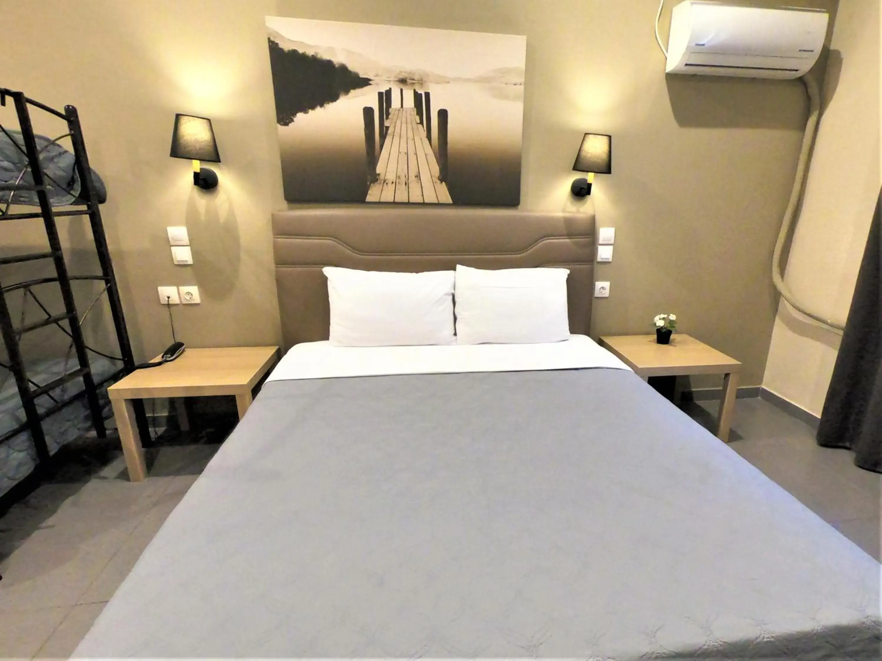 Bed in Achillion Hotel Piraeus