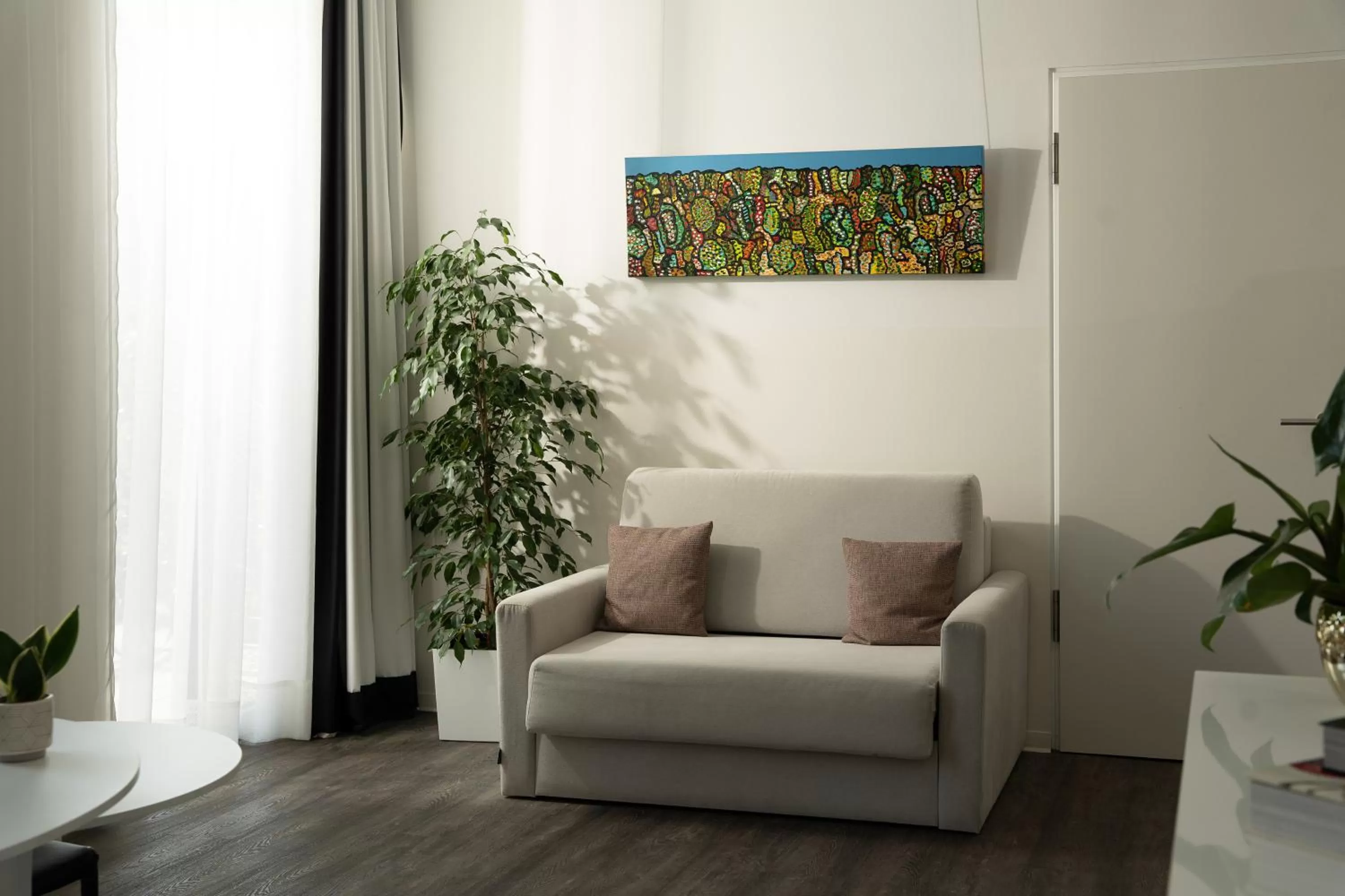 Living room in INNSiDE by Meliá Leipzig