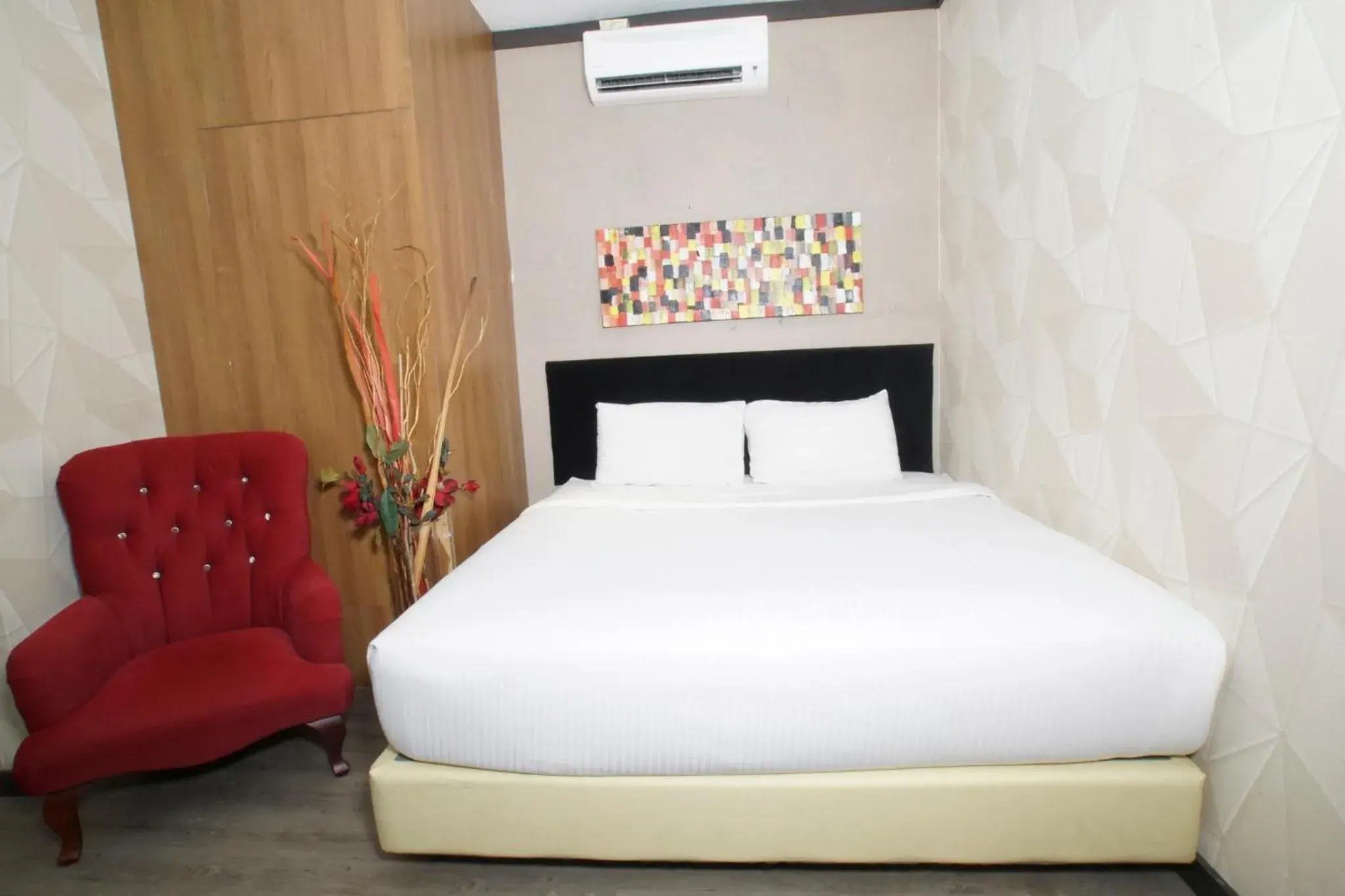 Bed in Vivids Hotel