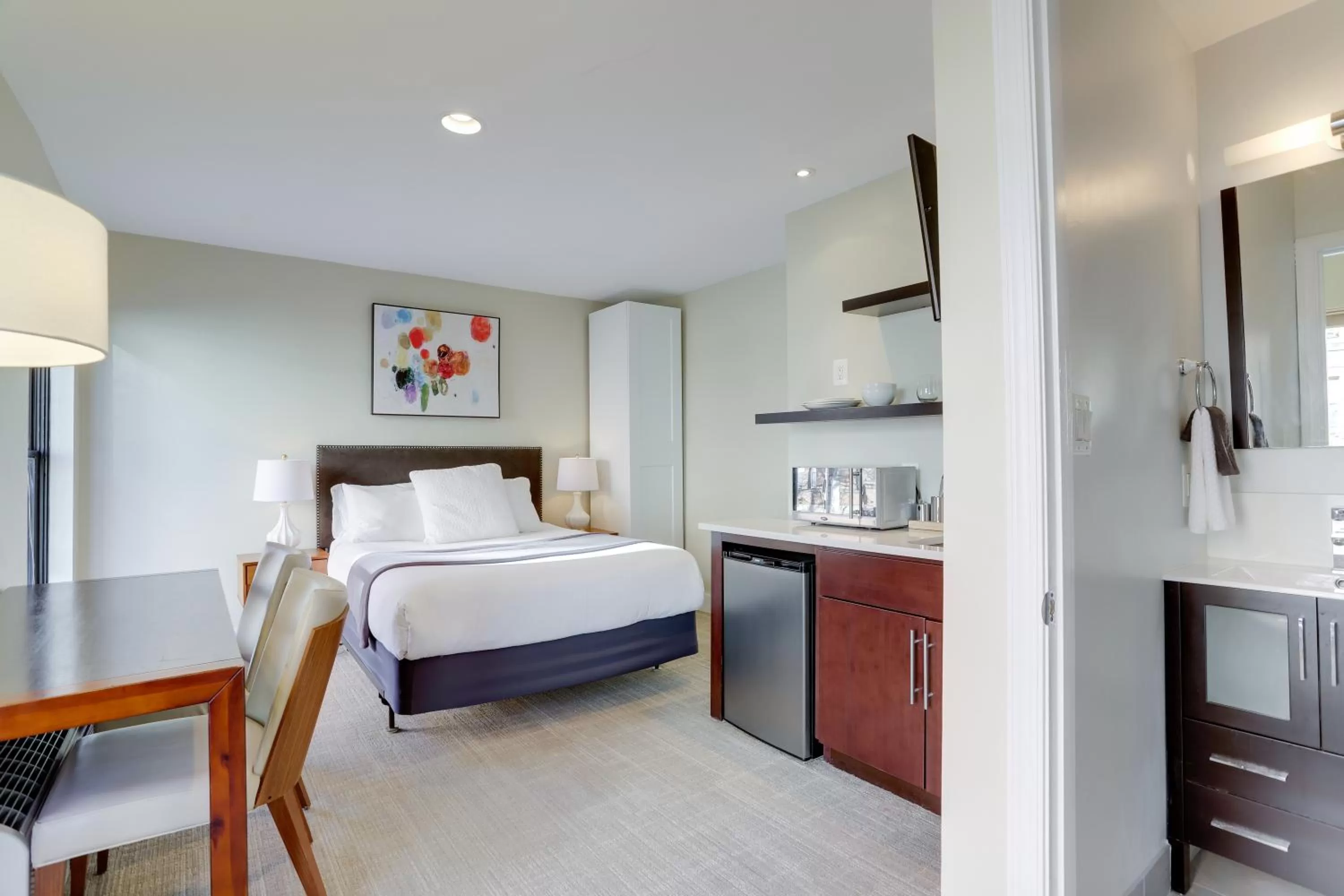 Bed in Sojourn at DuPont Place