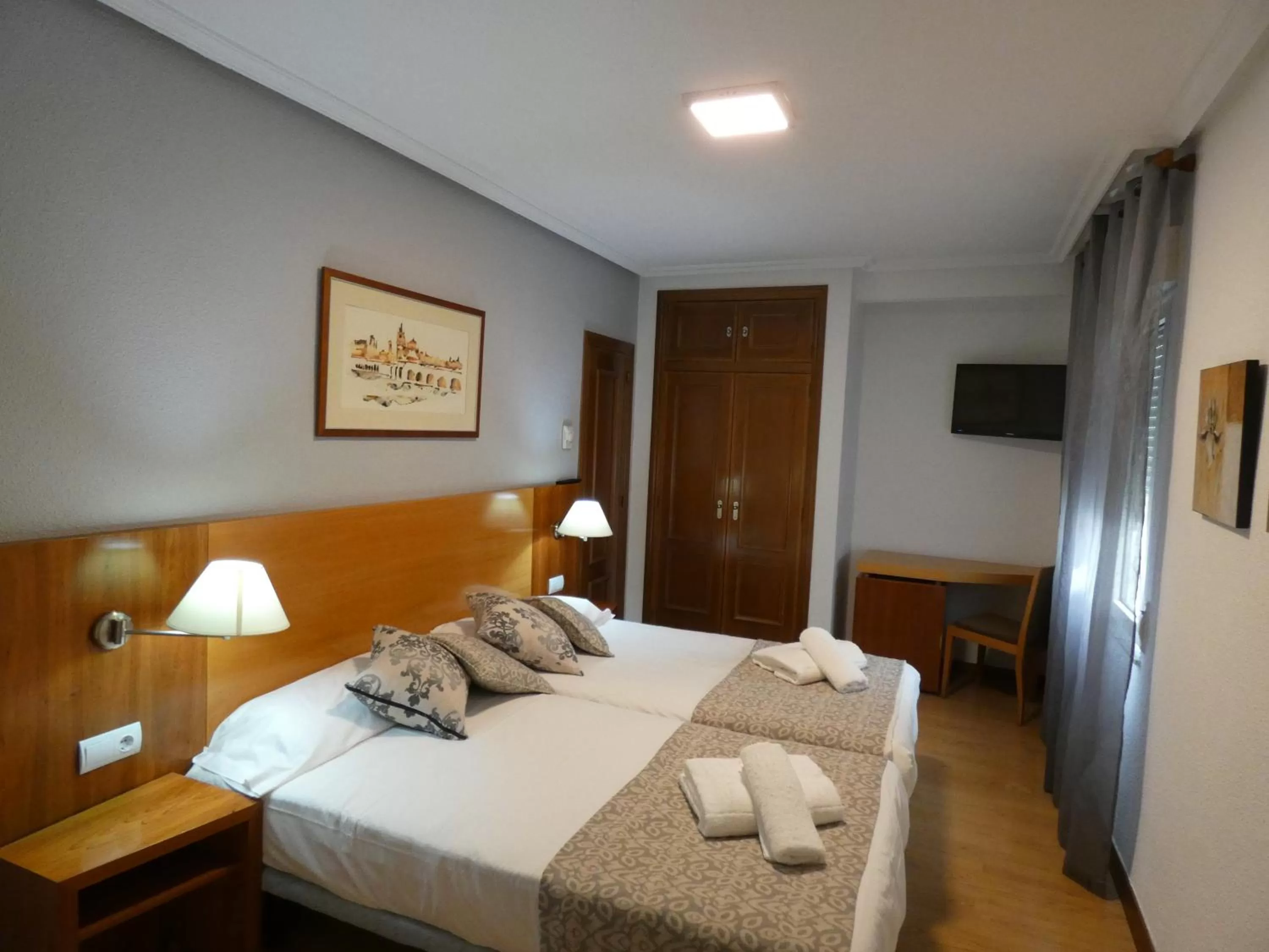 Bed in Hotel Mercado by gaiarooms