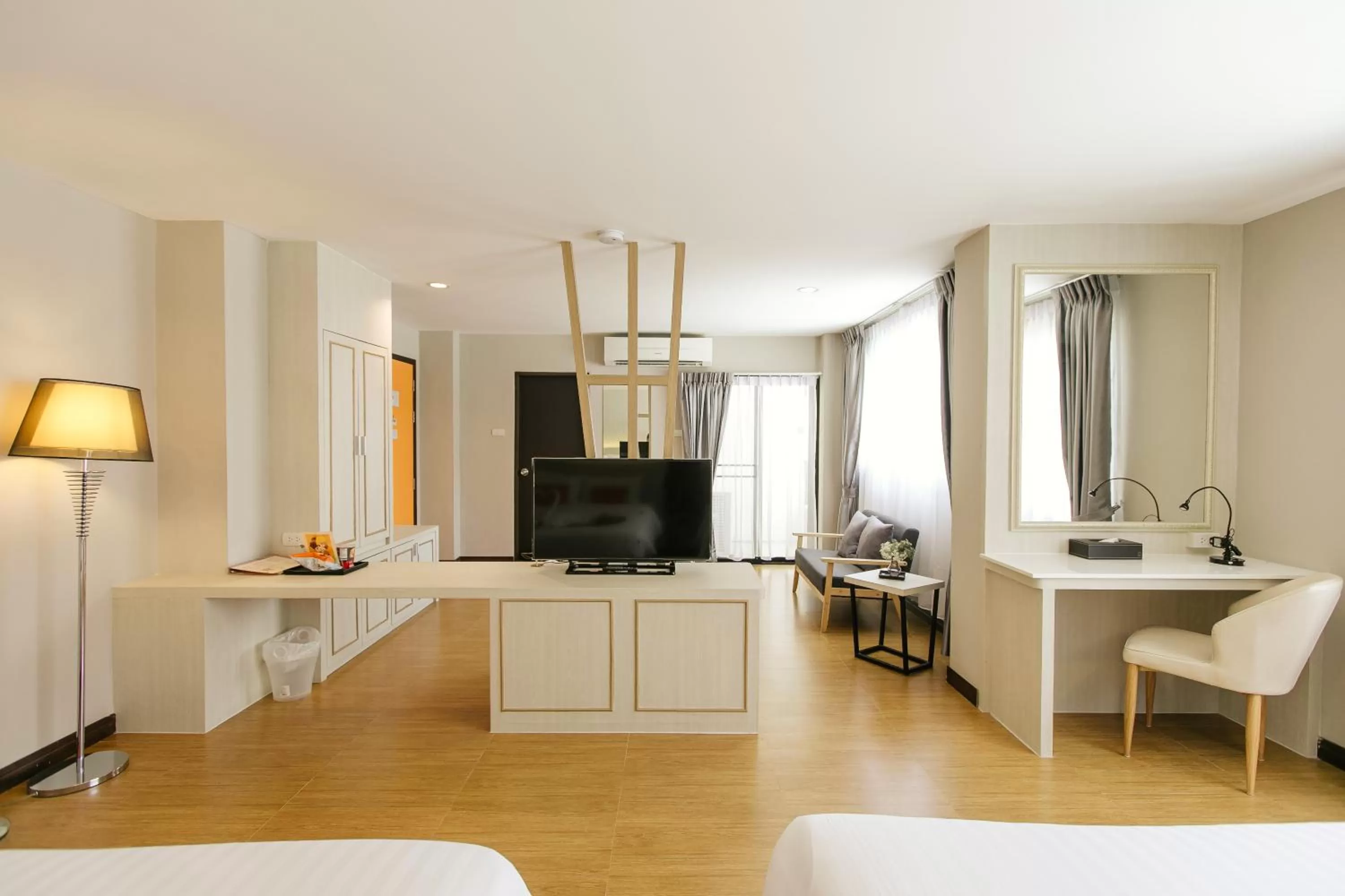 Bed in De Hug Hotel & Residence