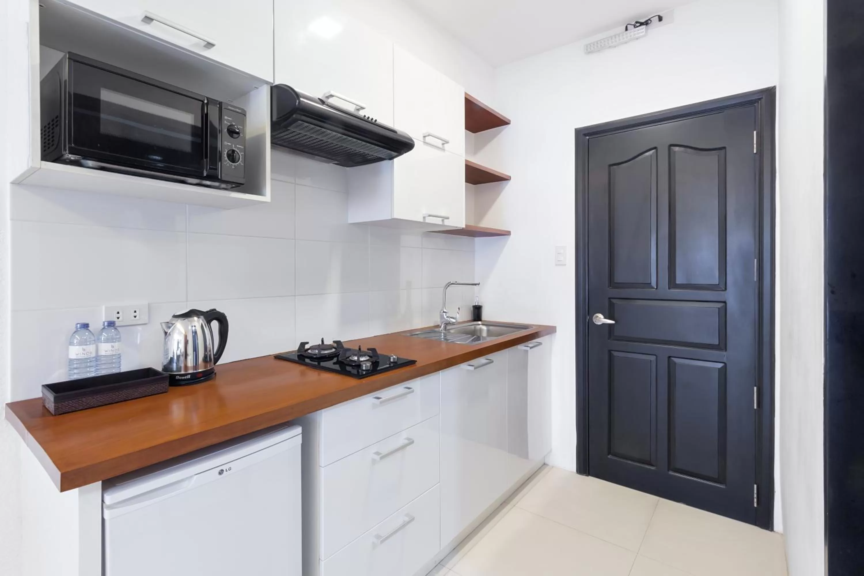 Kitchen or kitchenette in Winds Boutique Hotel