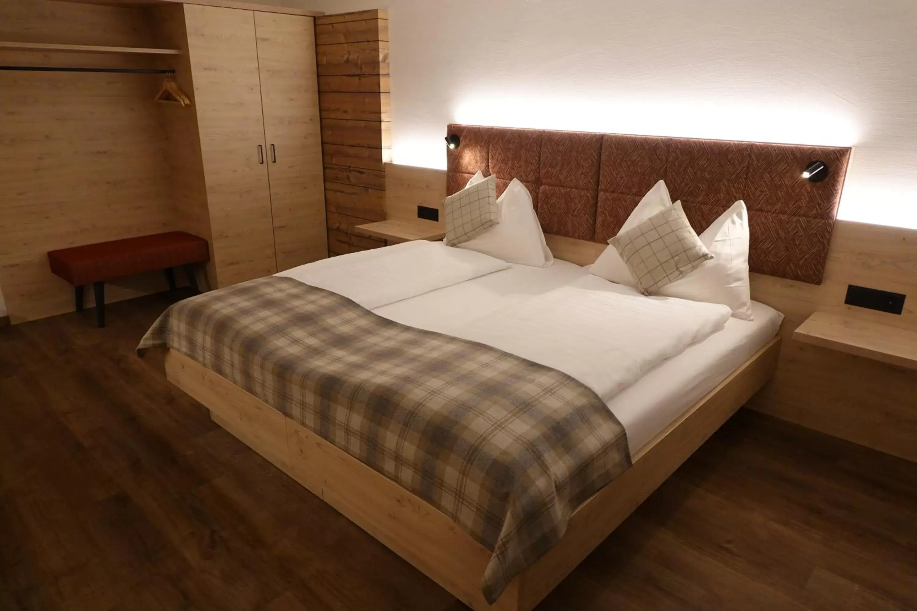 Bed in Hotel Schweizerhof
