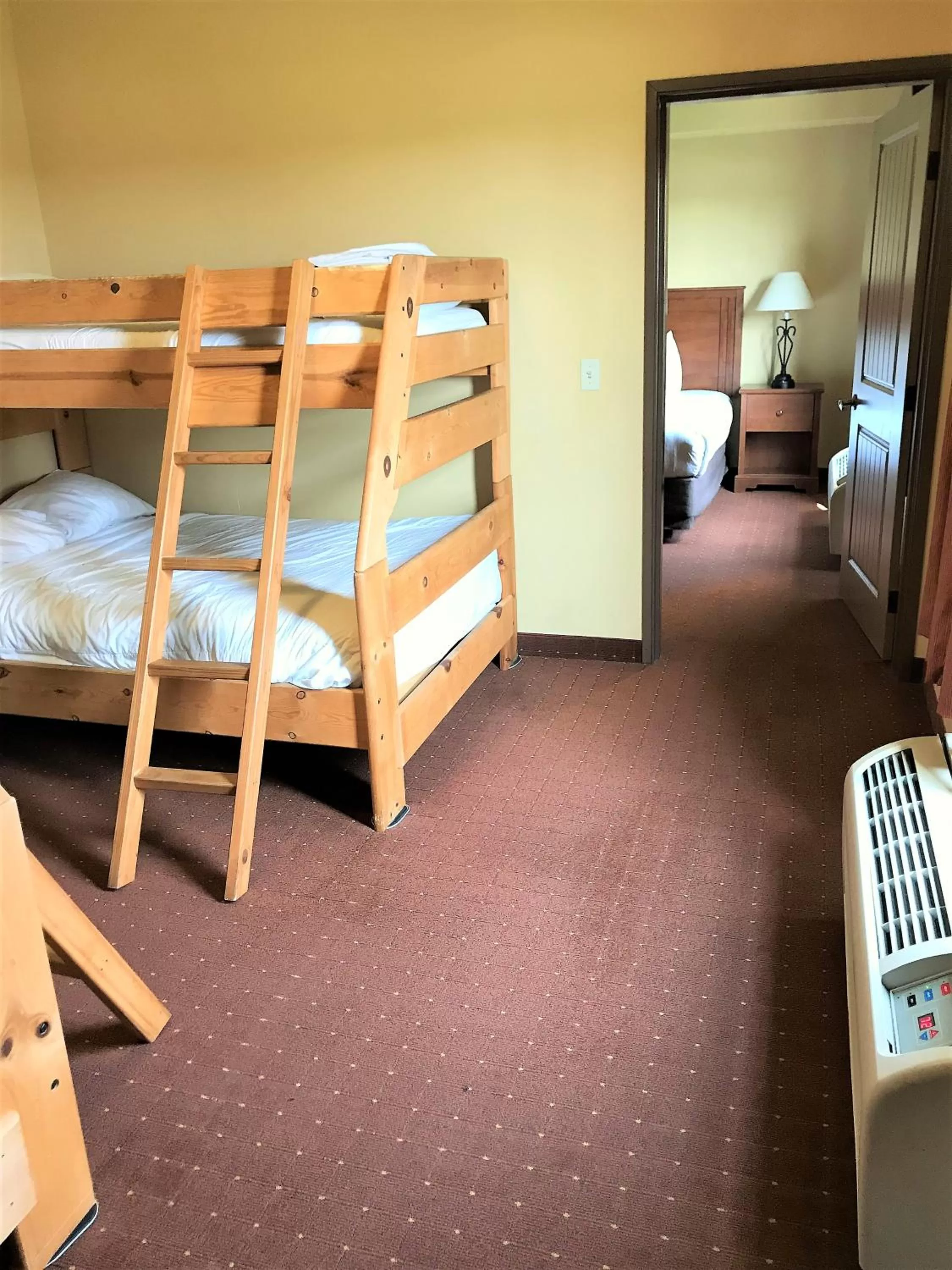 bunk bed, Bed in AmericInn by Wyndham Fargo Medical Center