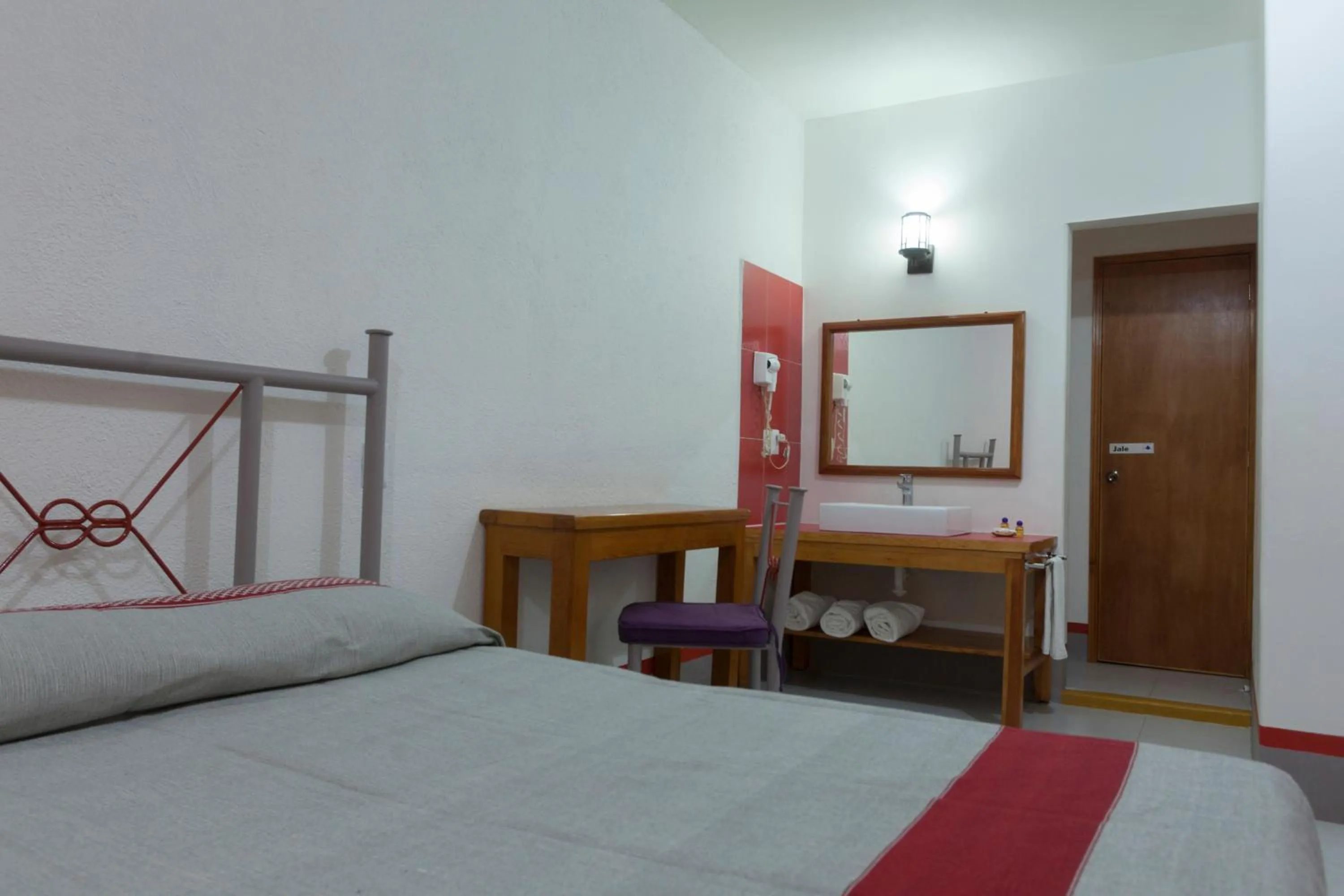 Bed in Hotel Posada el Cid