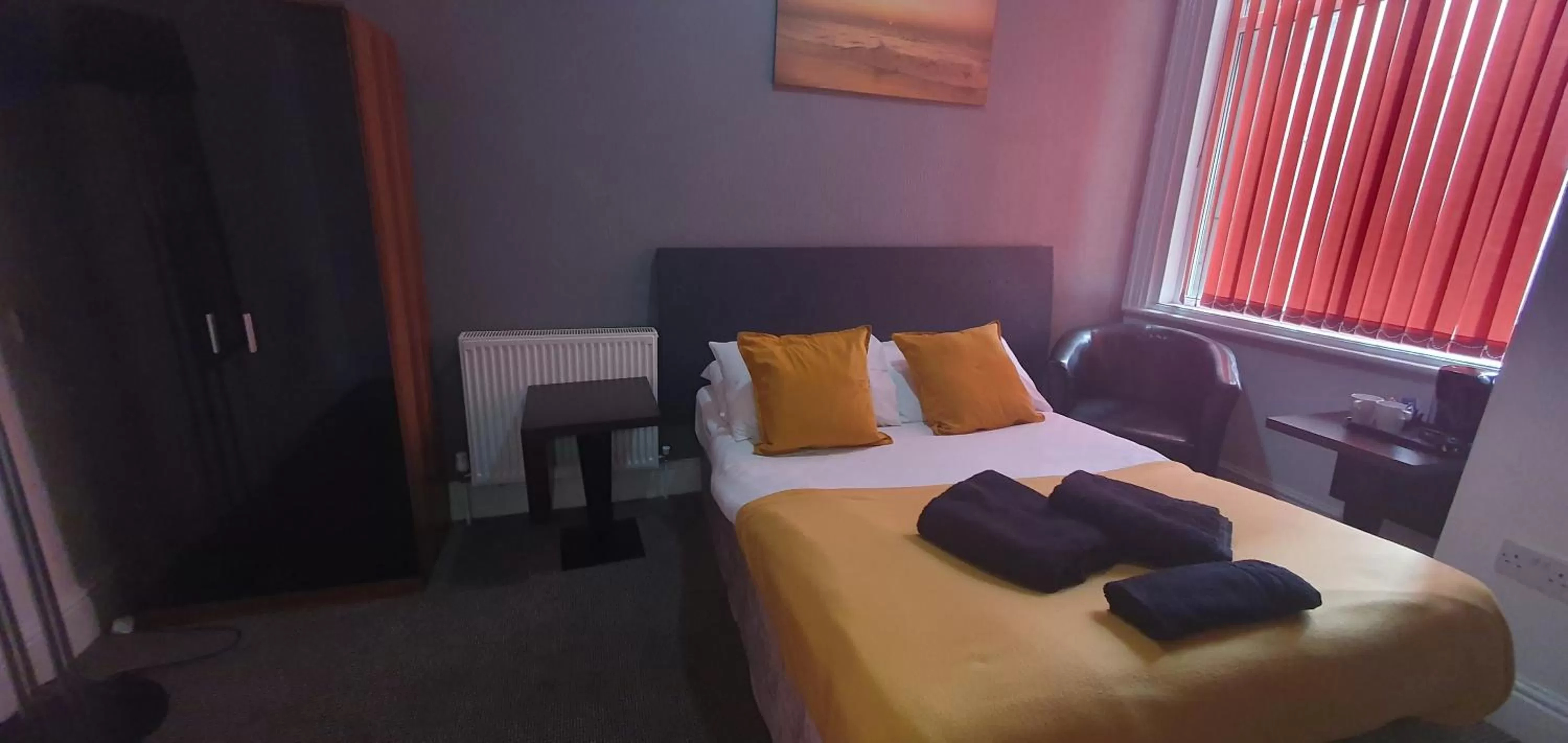 Bed in Palm Beach Hotel by the Sea