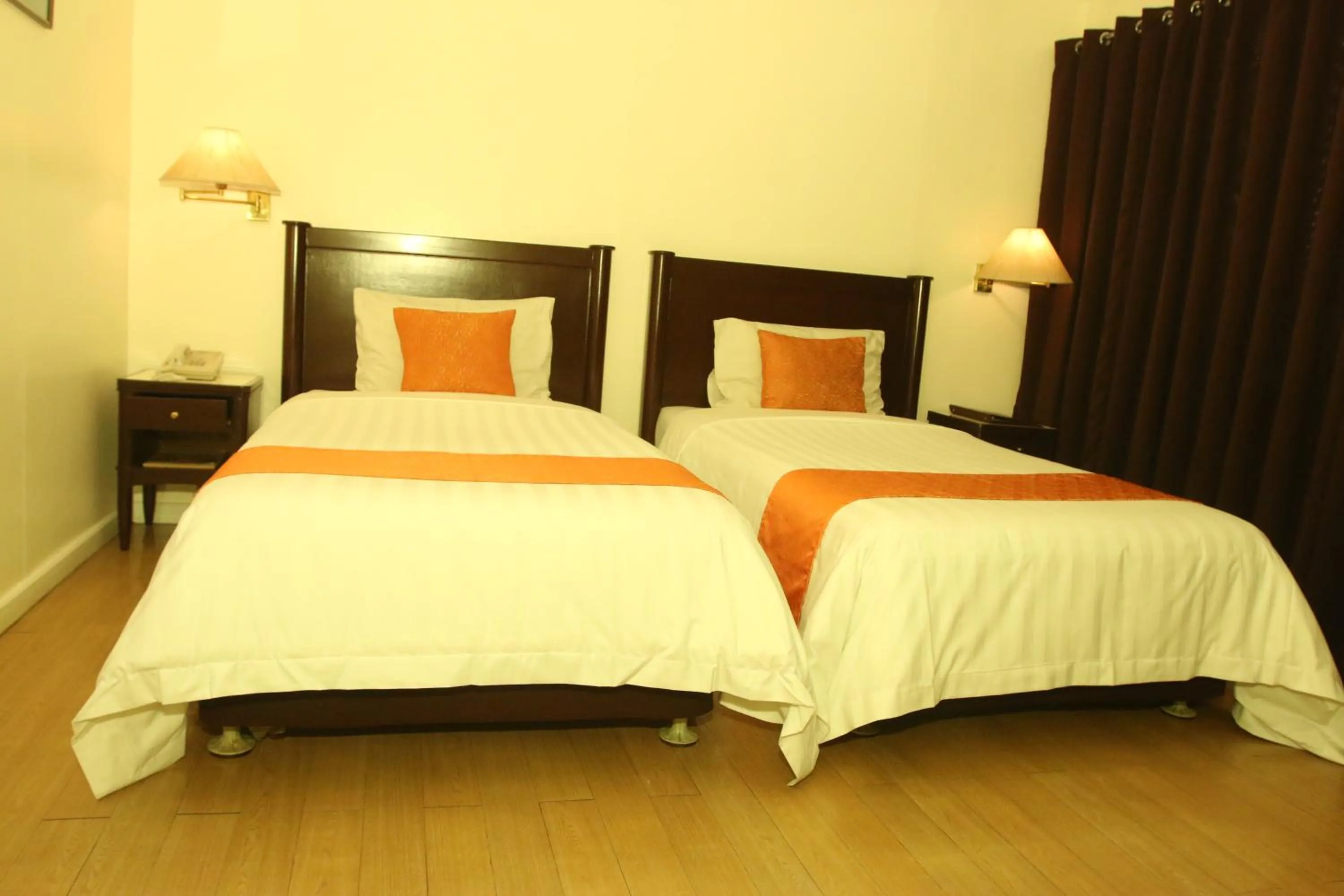 Bed in Harbor Town Hotel