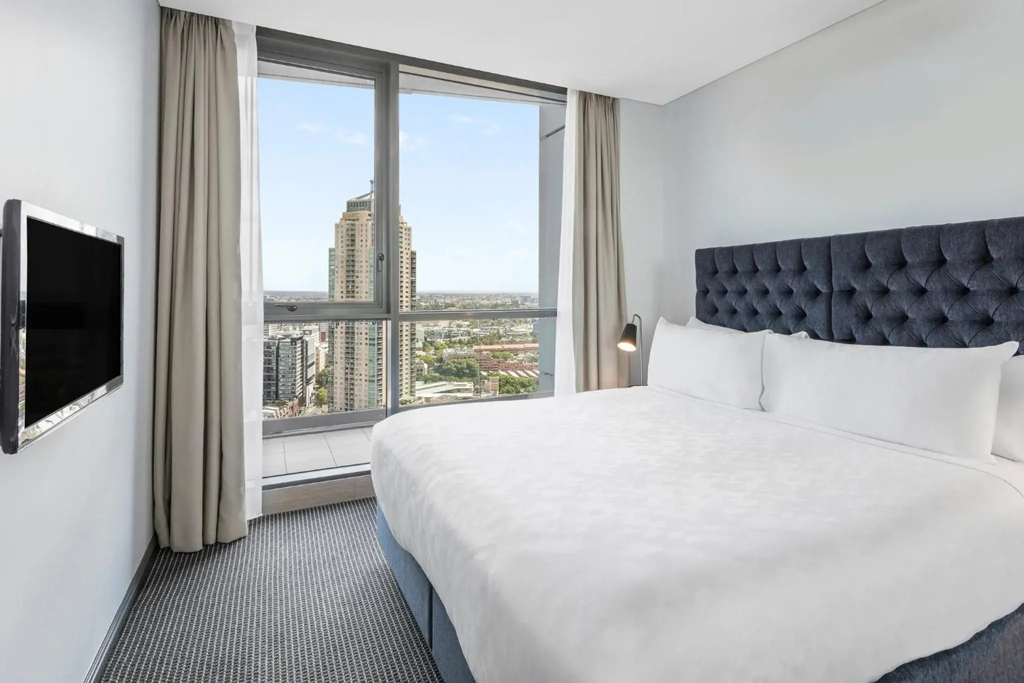 Bed in Meriton Suites Campbell Street, Sydney