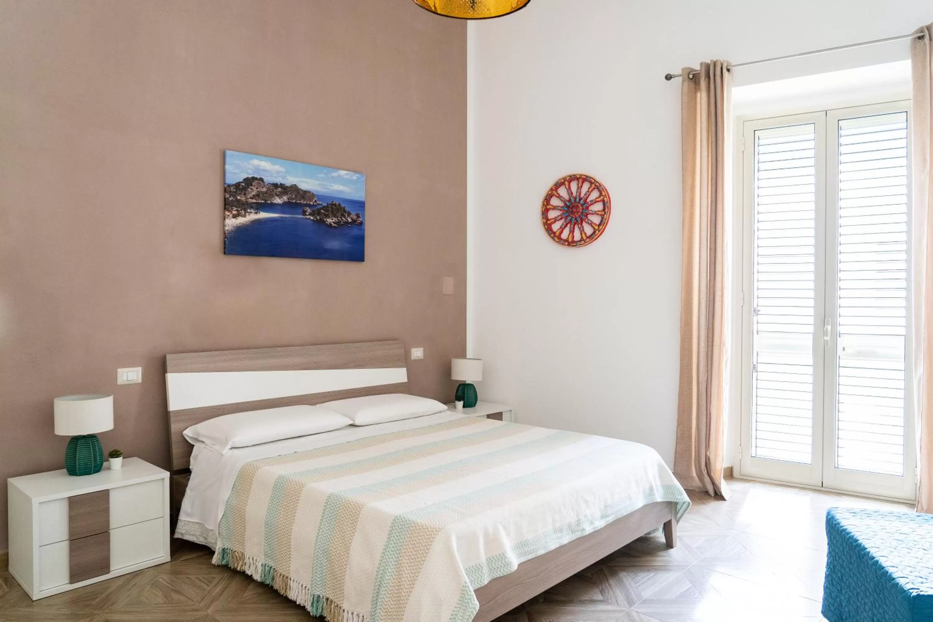 Bed in Portosalvo Rooms