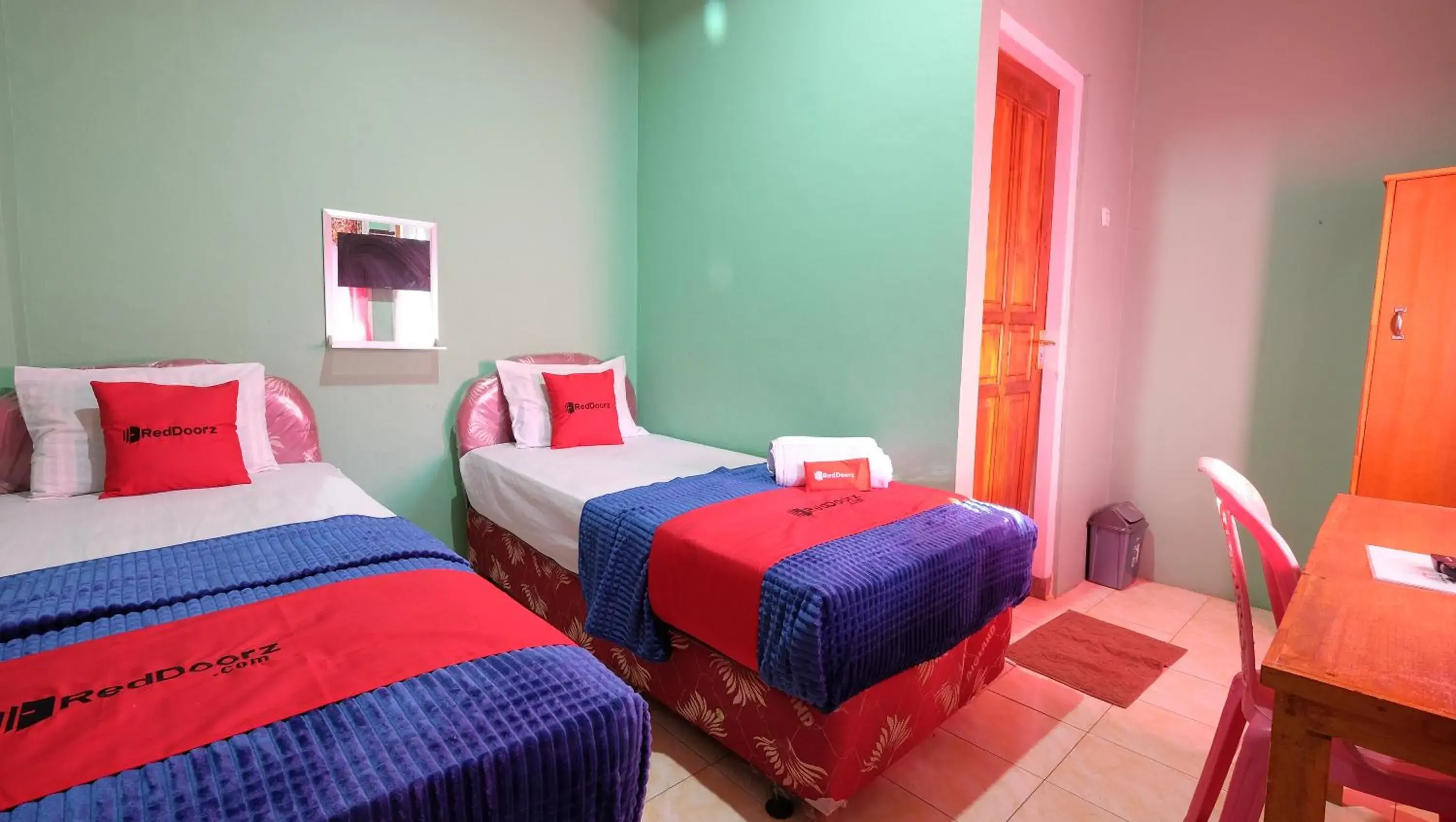 Bed in RedDoorz near Mangrove Forest Kupang Bed in RedDoorz near Mangrove Forest Kupang