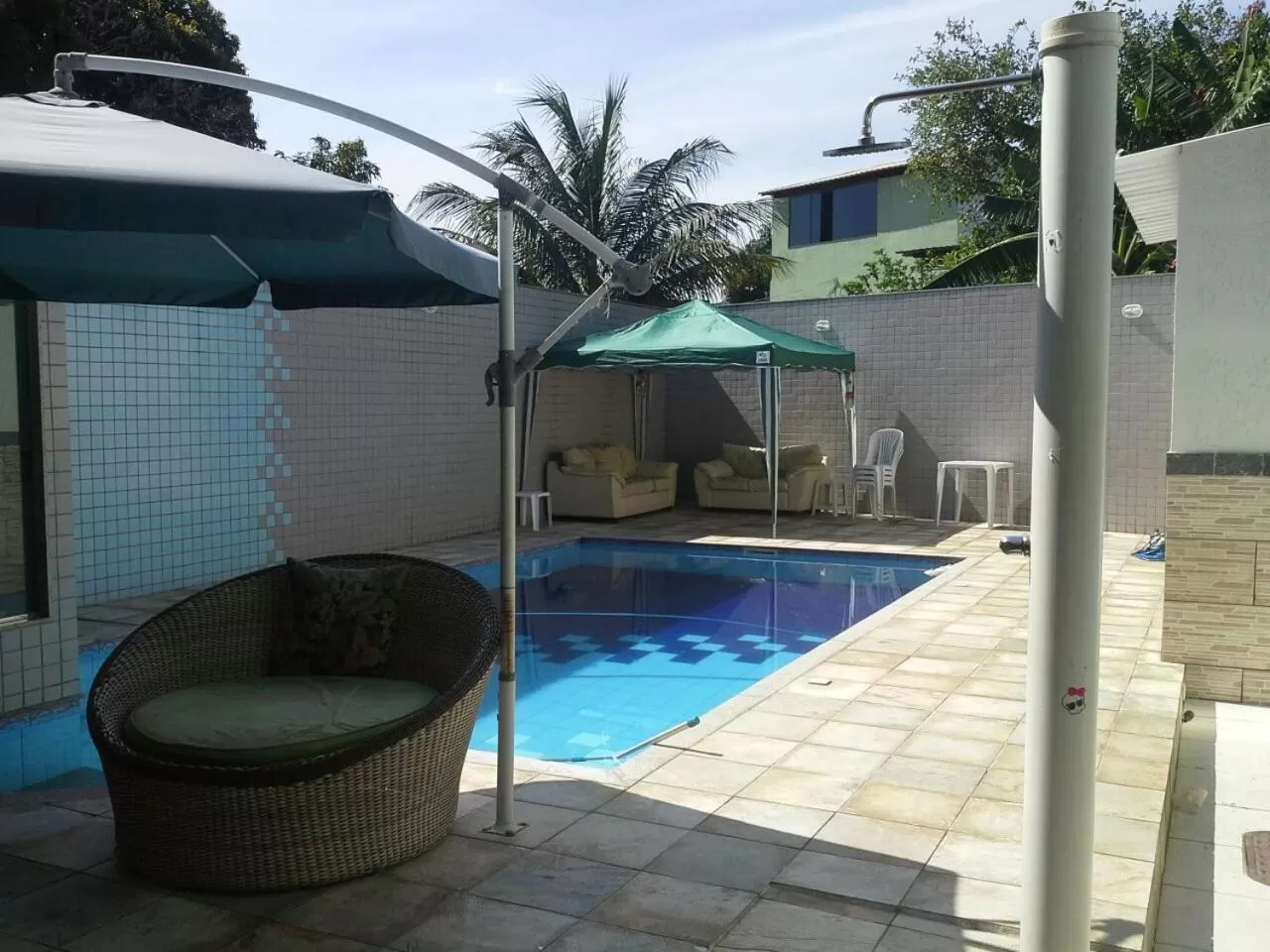 Swimming pool in Pousada Casa Familia