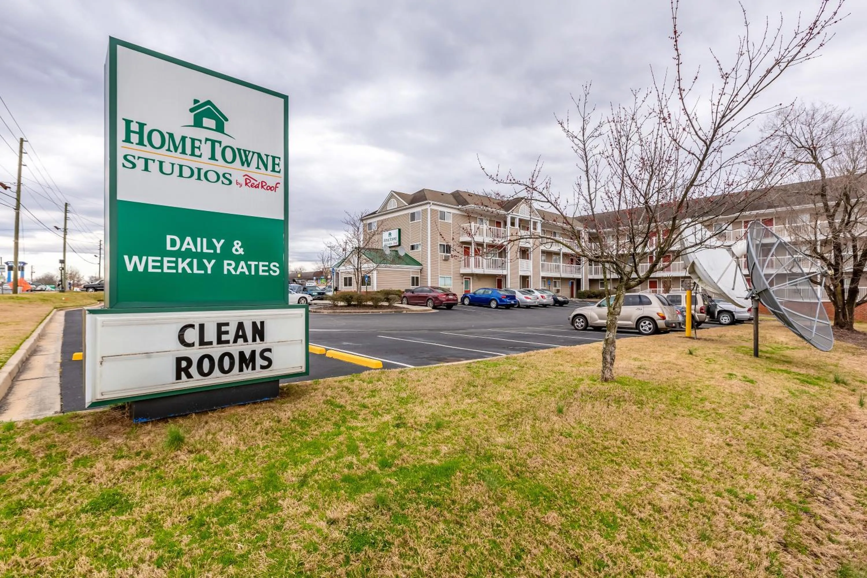 Property building in HomeTowne Studios by Red Roof Gainesville, GA