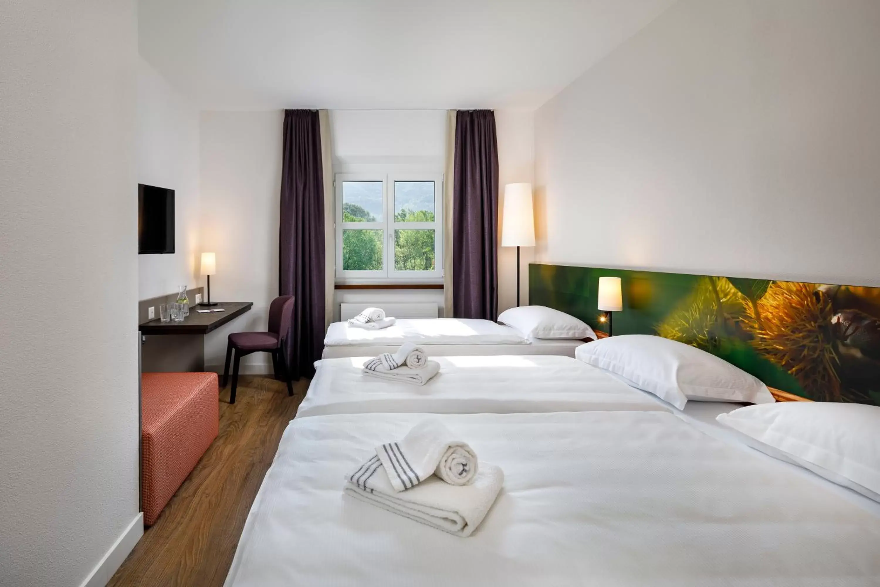 Bedroom, Bed in Hotel Bellinzona Sud Swiss Quality