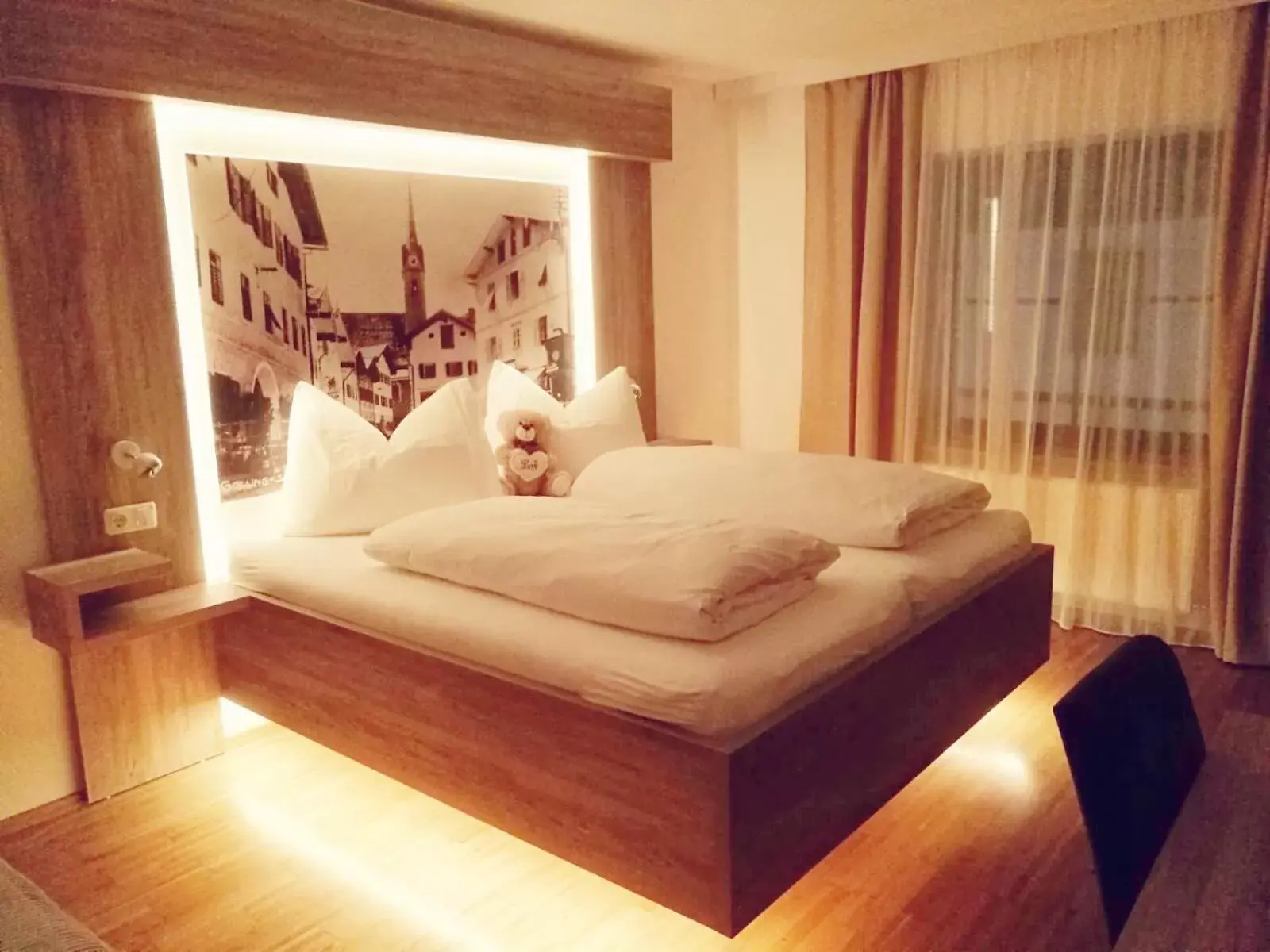 Bed in Hotel Adler