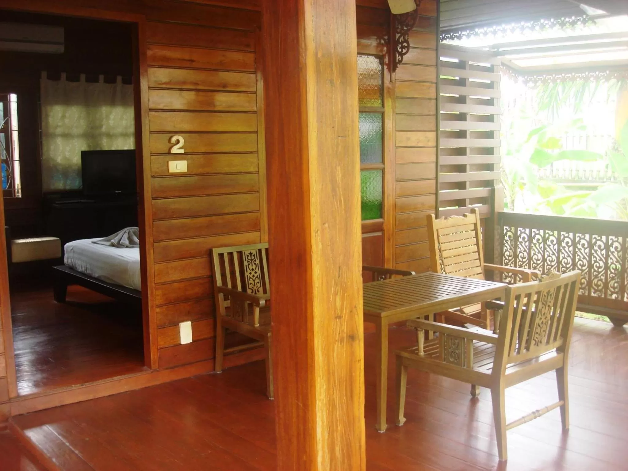 Patio, Bed in Cozy Garden Resort