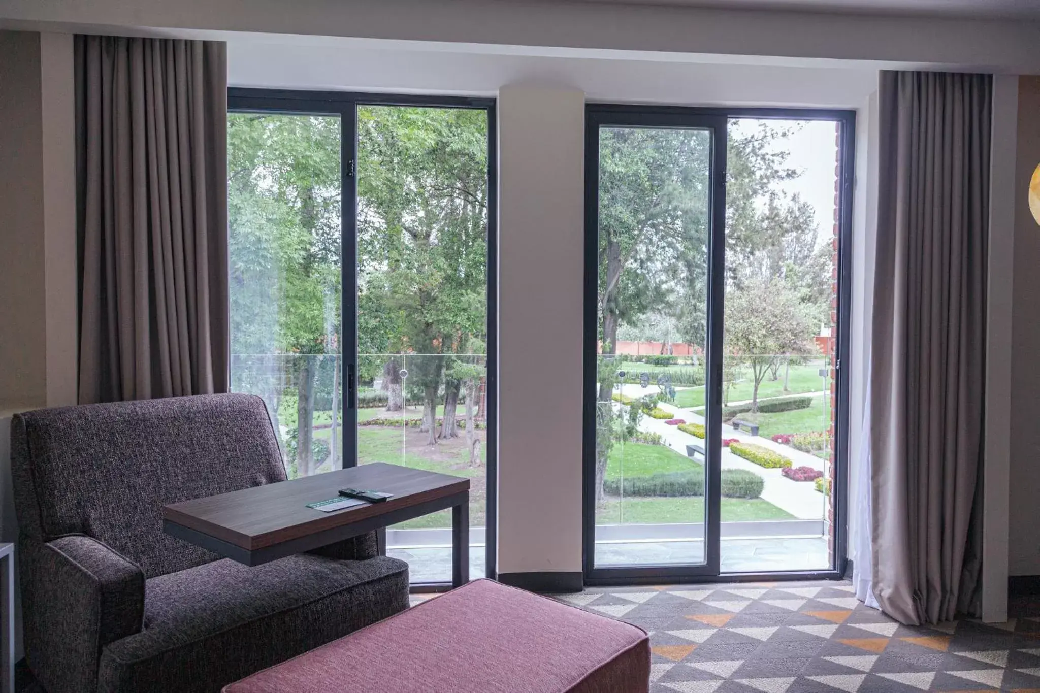 Photo of the whole room, Seating Area in Holiday Inn Tlaxcala, an IHG Hotel