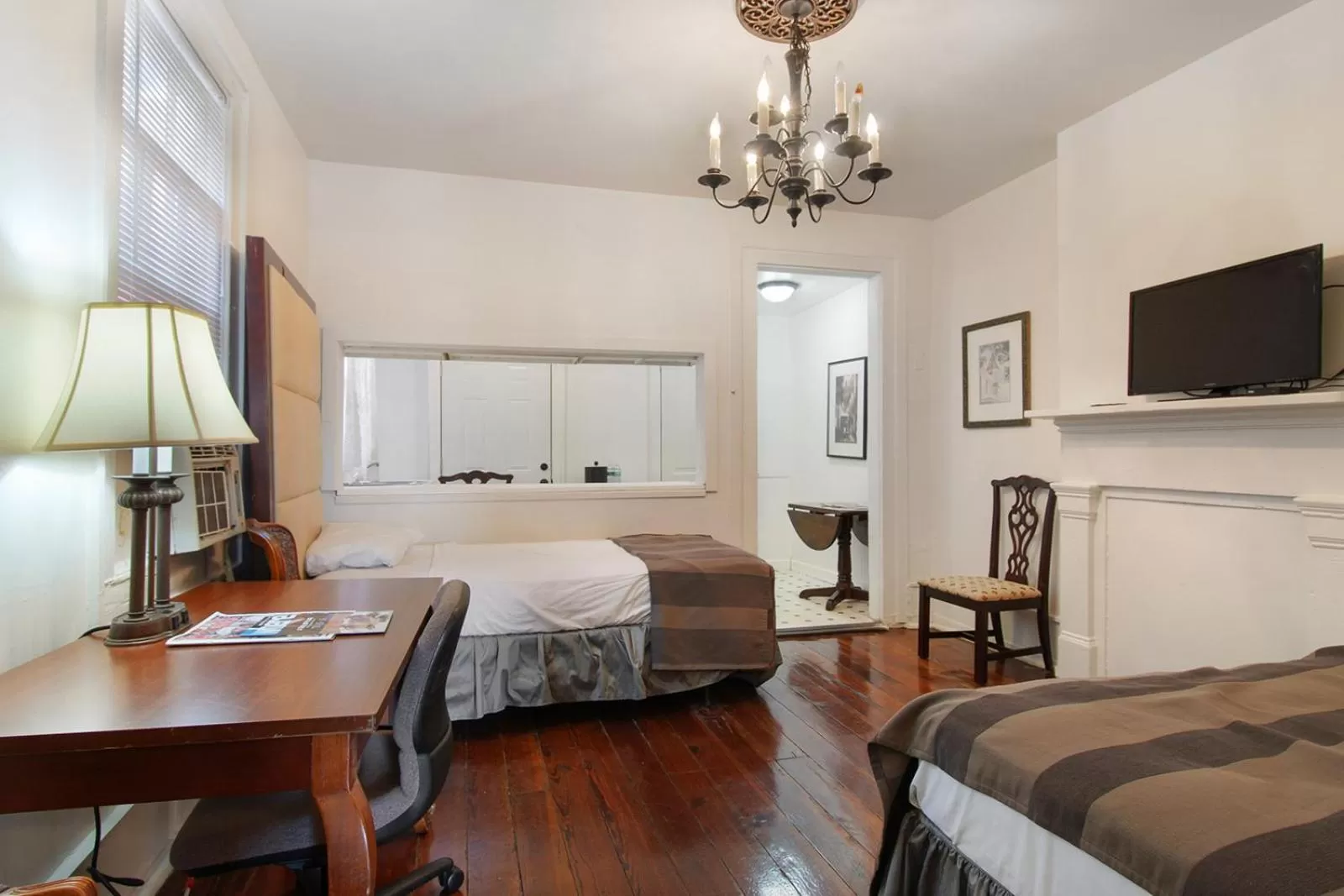 Bed in Historic Mardi Gras Inn