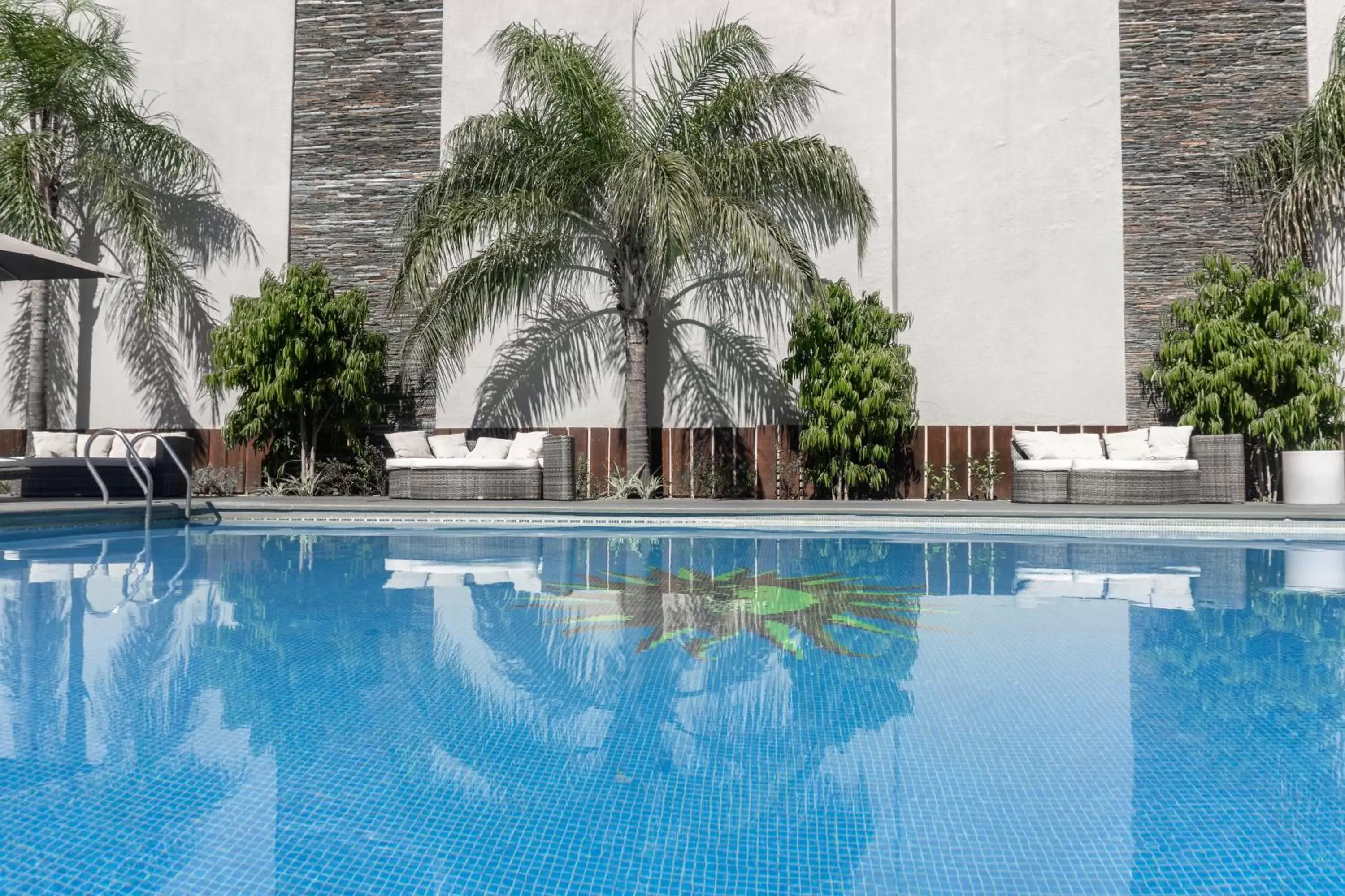 Day, Swimming Pool in Holiday Inn Rosario, an IHG Hotel