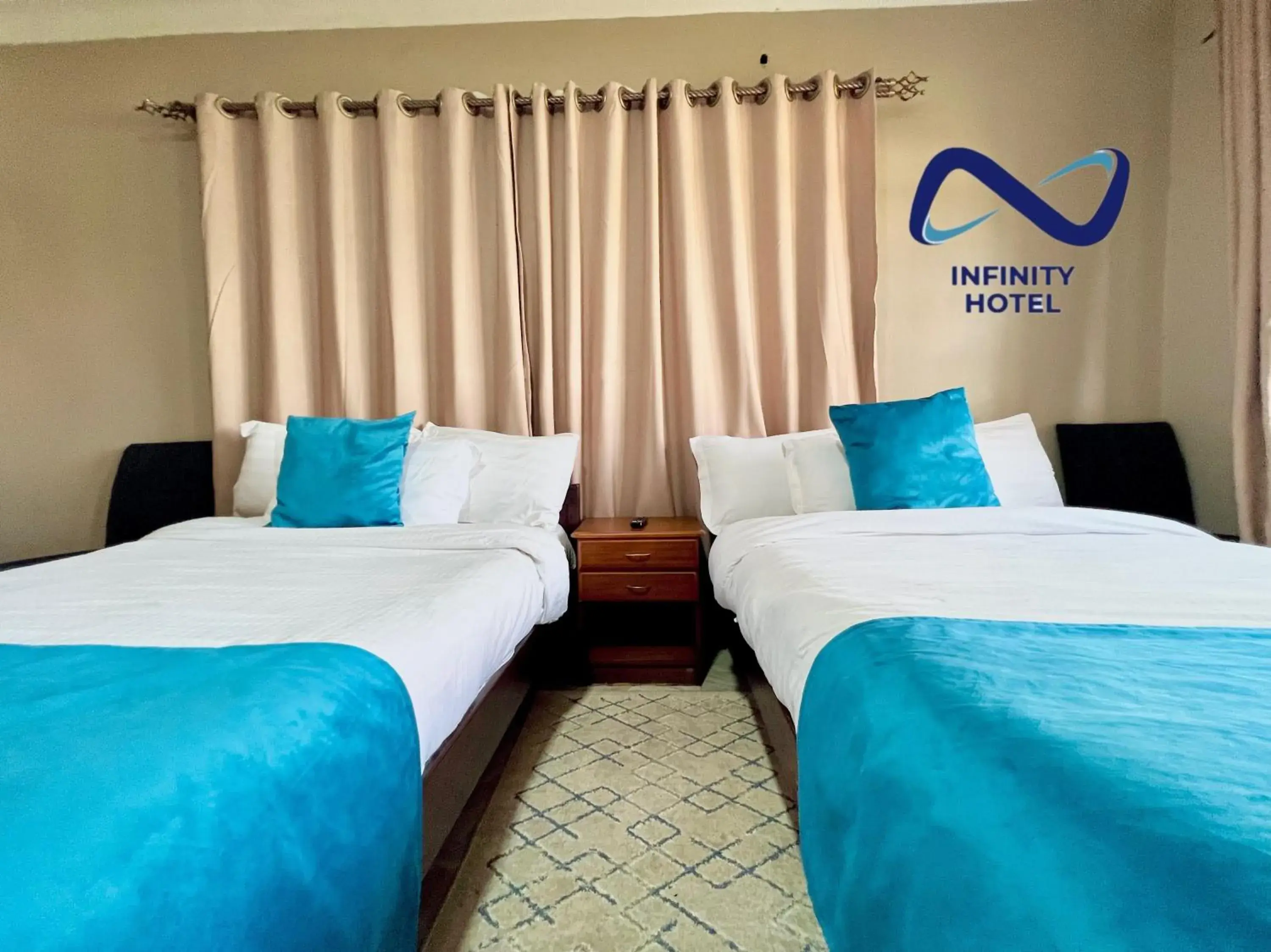 Bedroom, Bed in Infinity Hotel Kampala