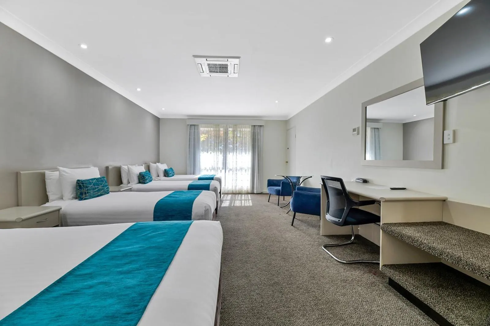 Bed in Central Caleula Motor Lodge