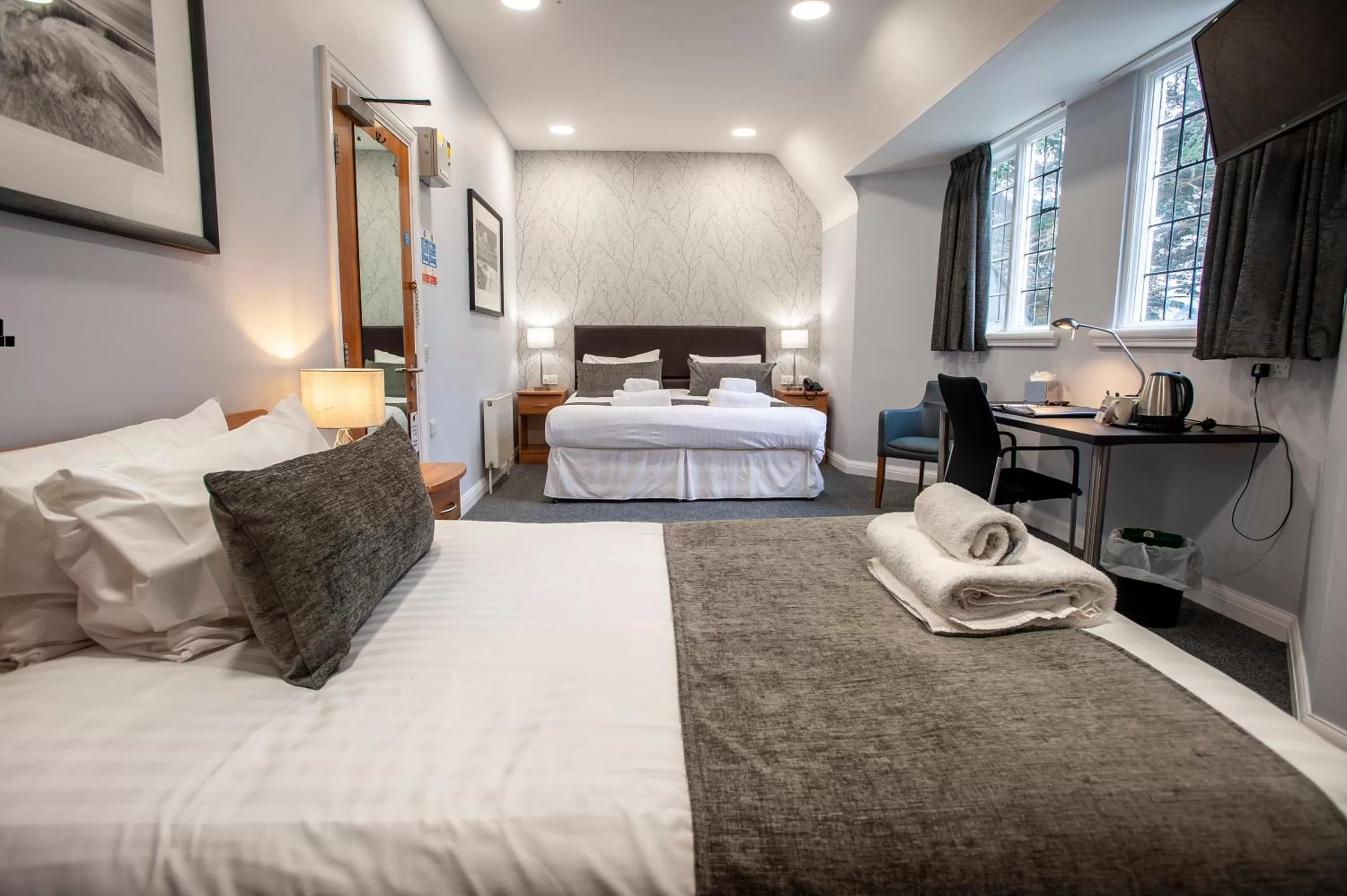 Photo of the whole room, Bed in The Management Centre