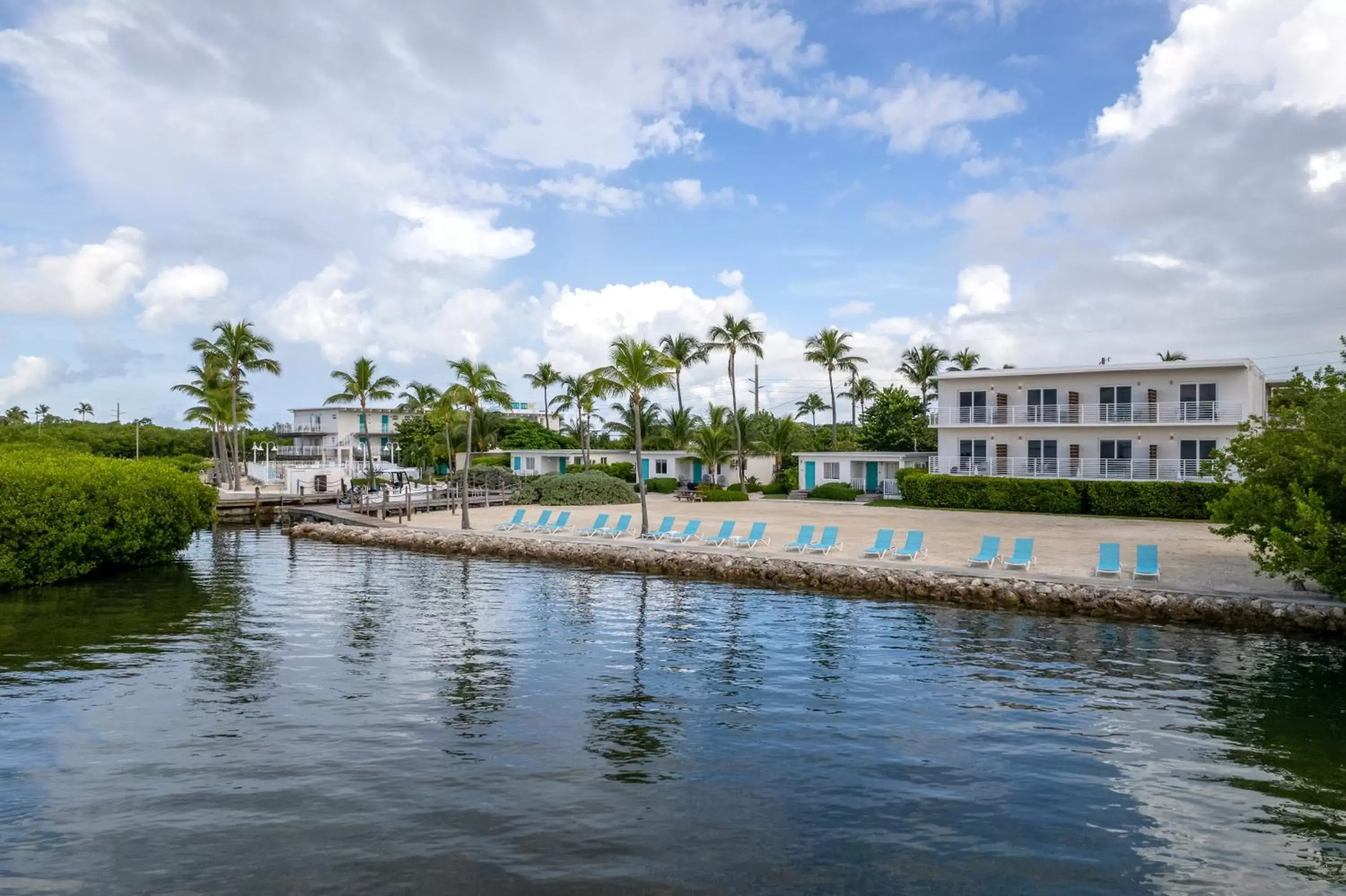 Property building, Swimming Pool in Fisher Inn Resort & Marina