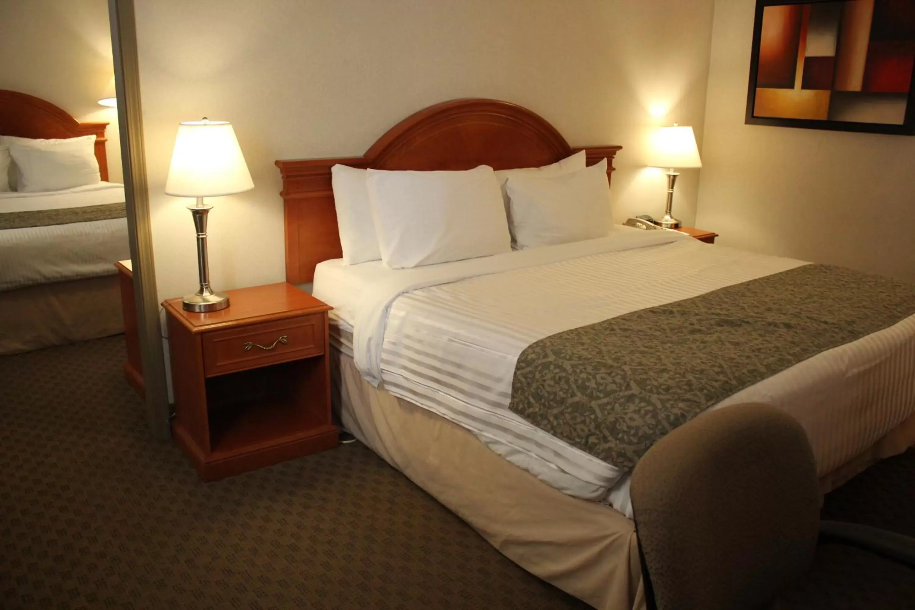 Photo of the whole room, Bed in Ramada by Wyndham Edmonton South