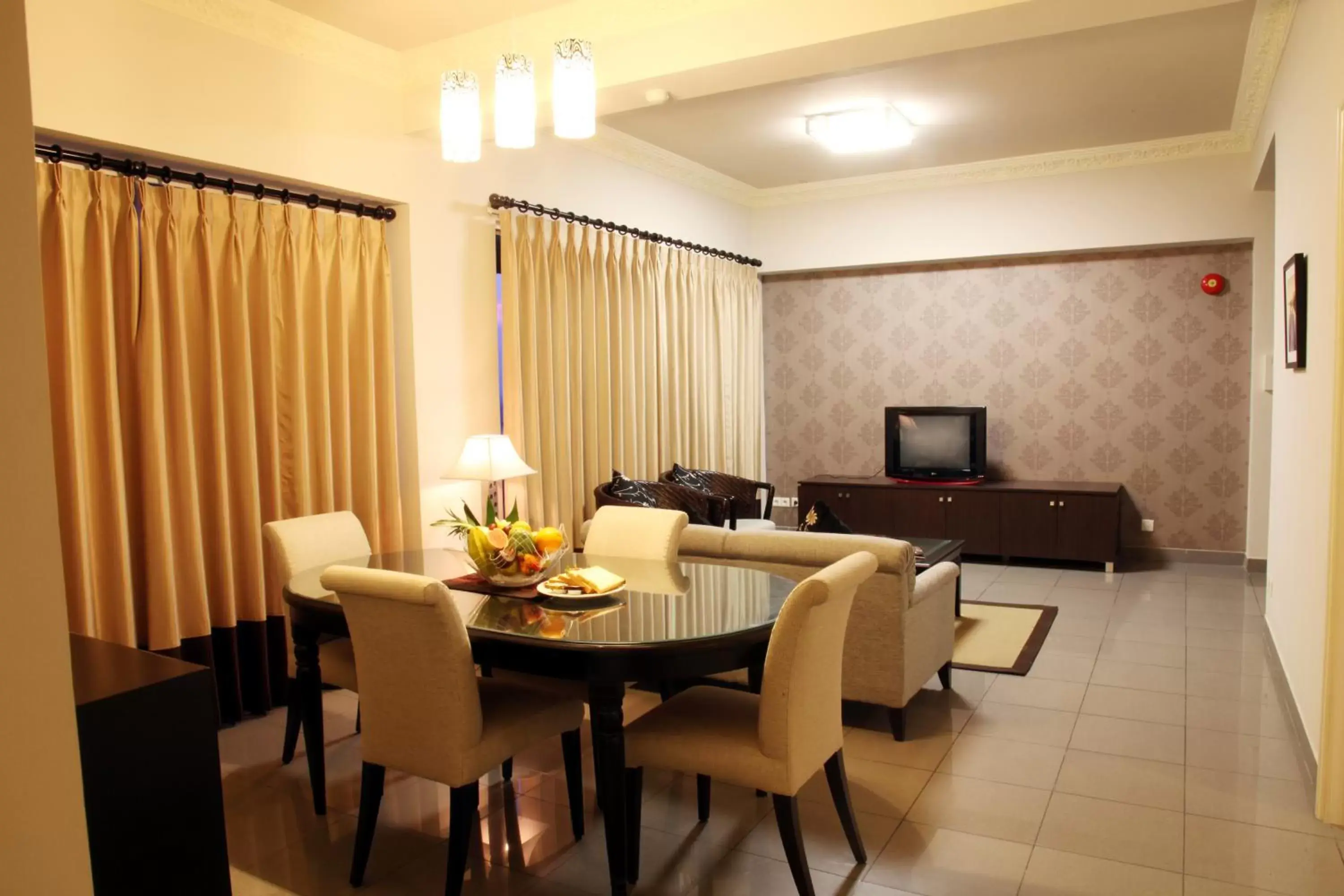 Living room, Dining Area in Java Paragon Hotel & Residences